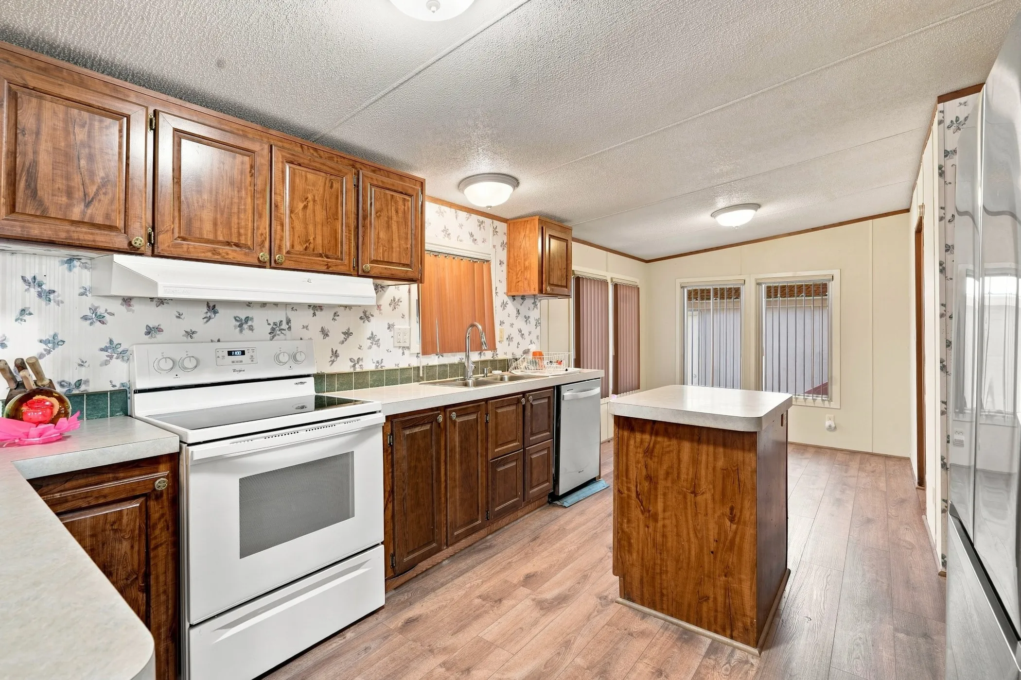 Kitchen, bright and spacious with an abundance of countertop space and beautiful cabinetry