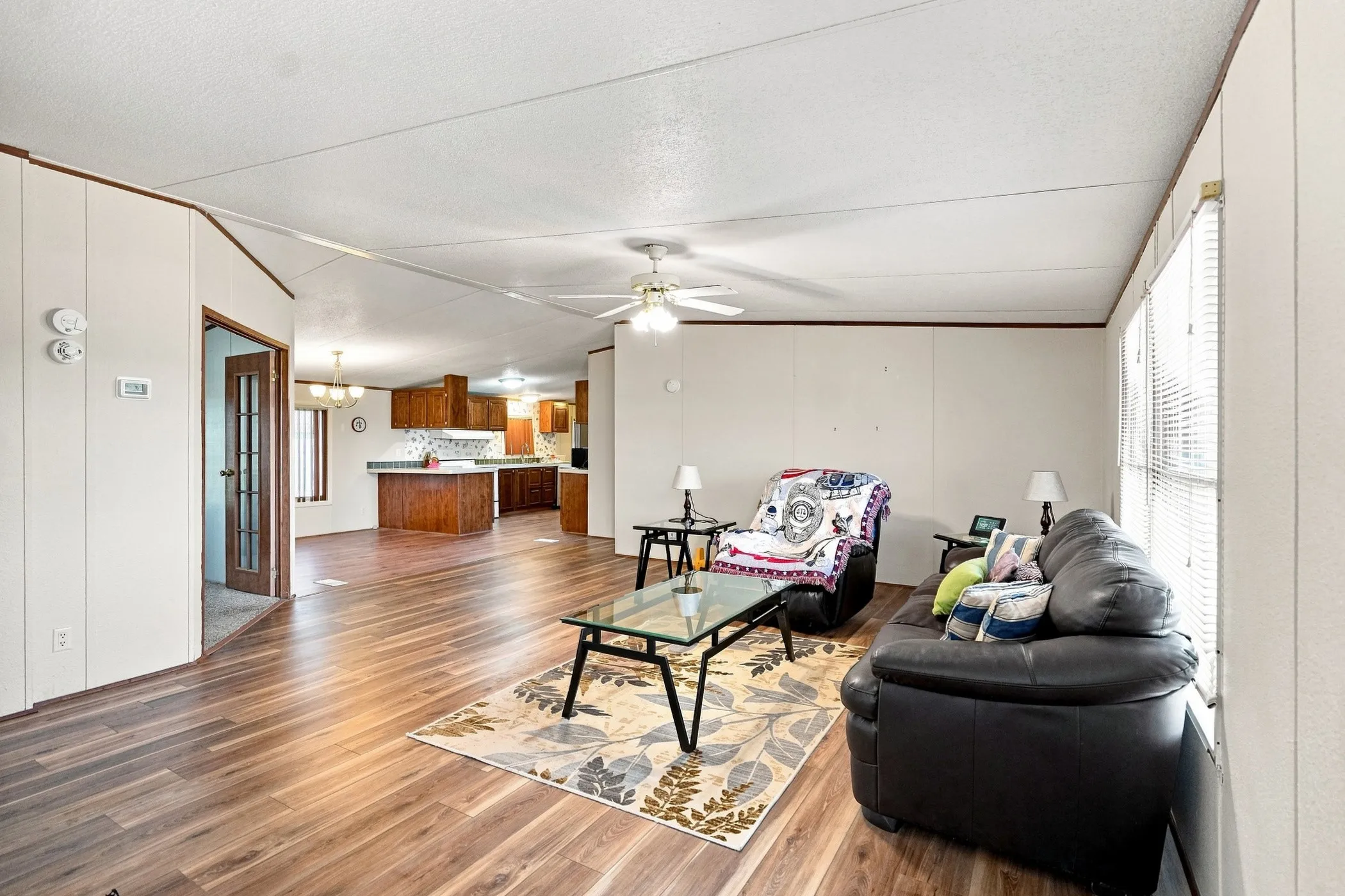 Open concept, living room and kitchen. The opening in the left of the photo is the dedicated offie area or second living area, endless possibilities