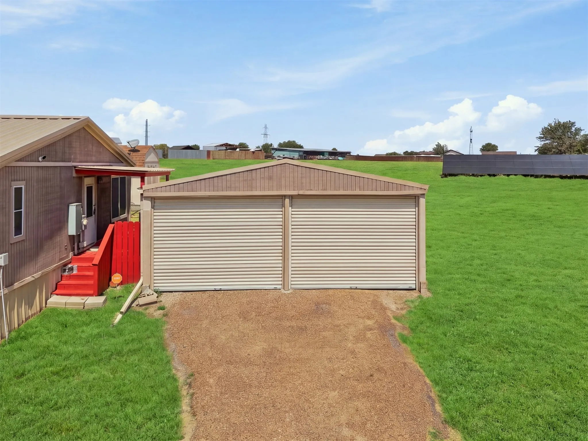 Detached two-door garage with roll-up​​‌​​​​‌​​‌‌​‌‌​​​‌‌​‌​‌​‌​​​‌​​ doors