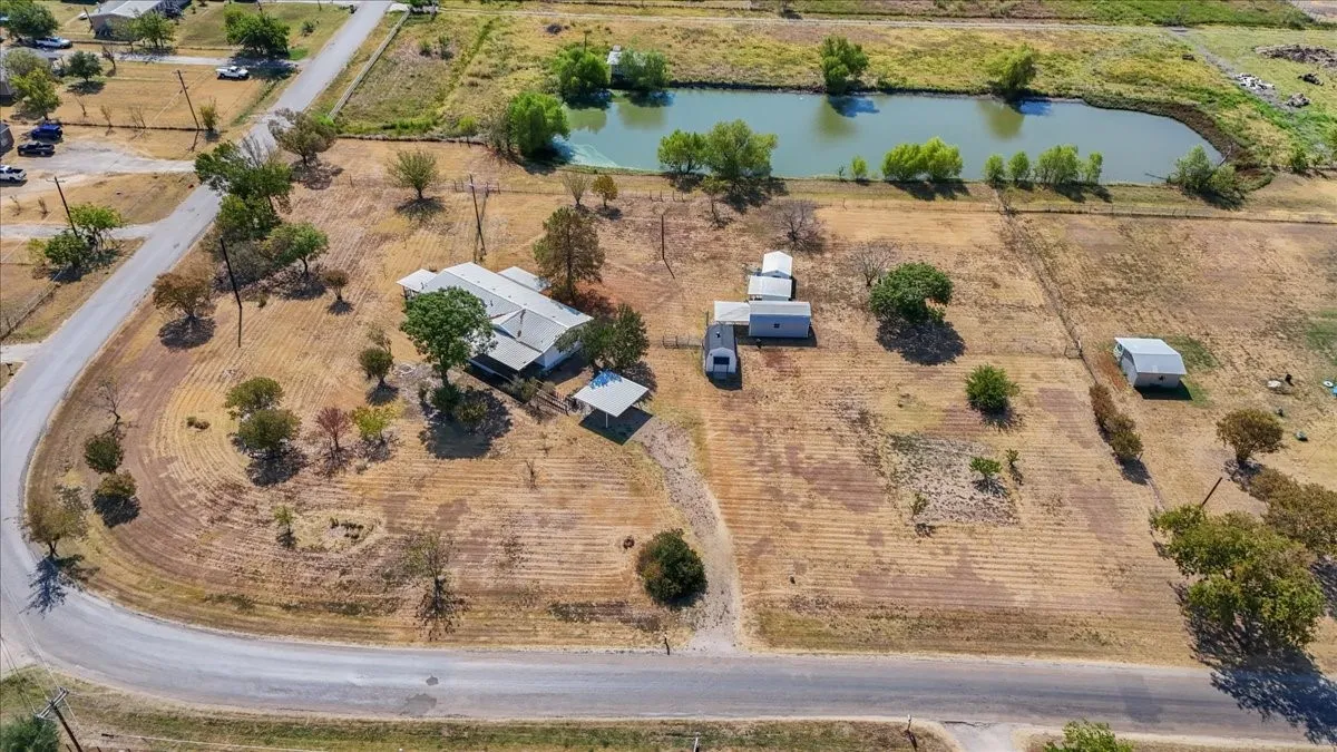 Property with multiple structures, including a main residence and detached buildings