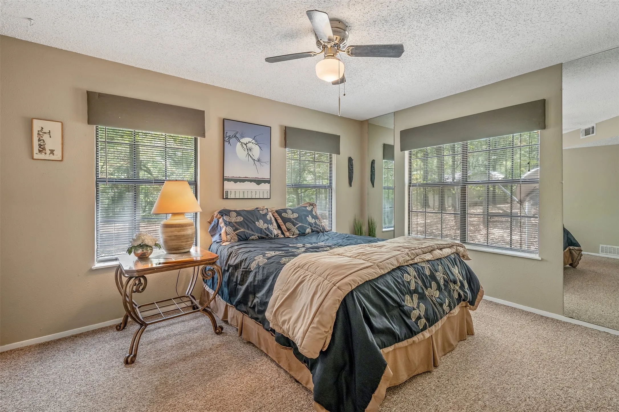 Wall-to-wall carpeting with two large windows