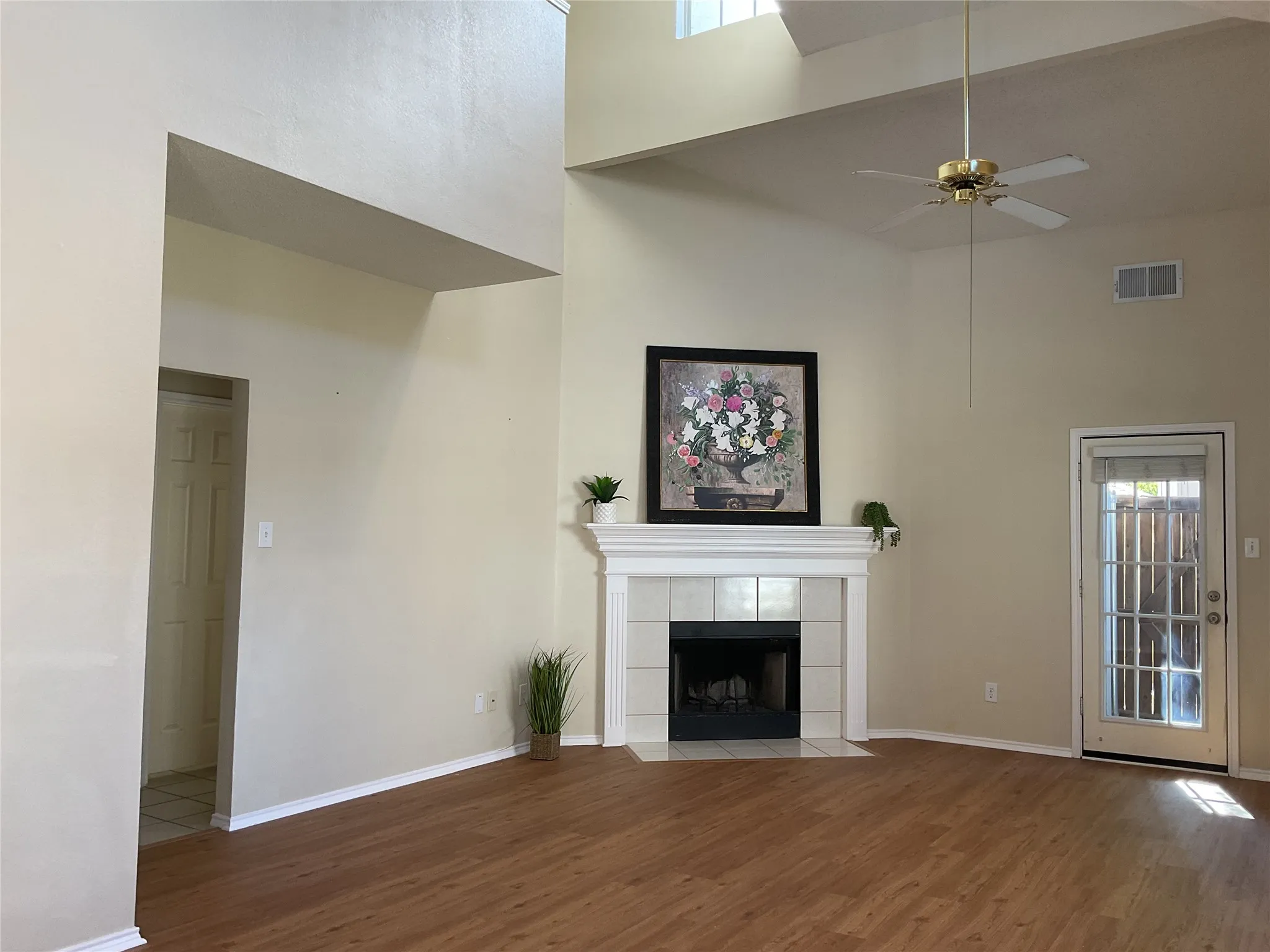 living room with wood burning fire place