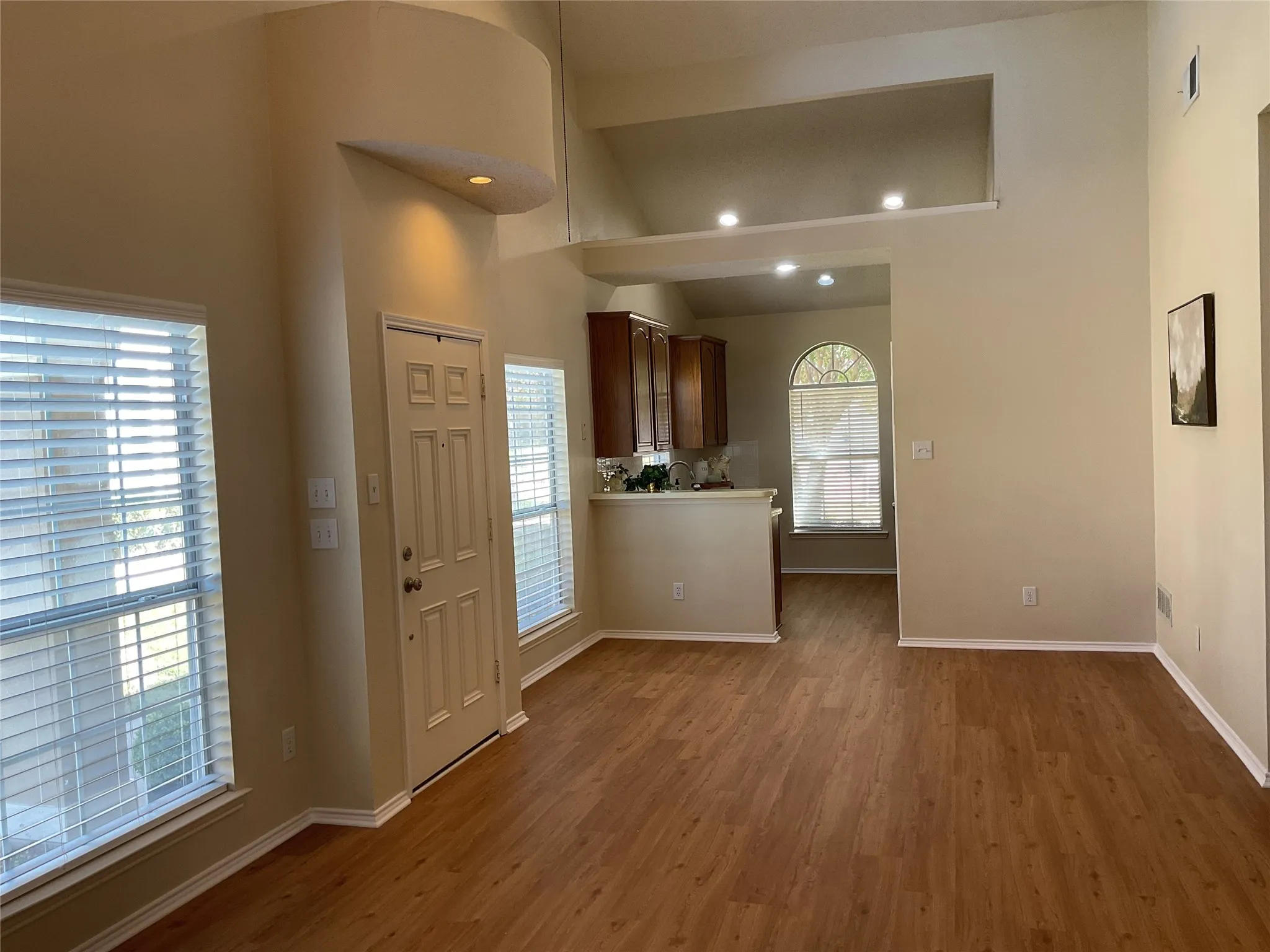 once inside notice the grand 2 story vaulted ceilings and open floor plan