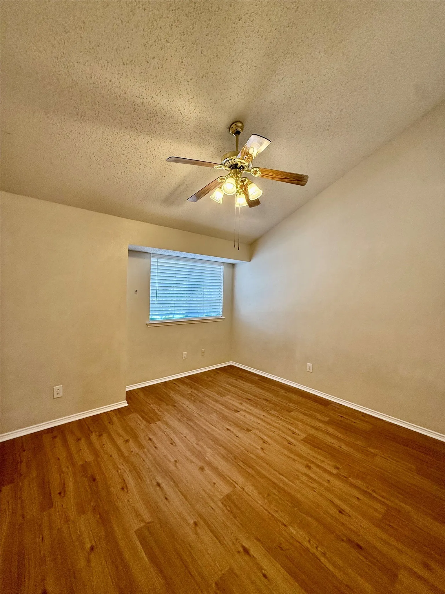 east bedroom also features vaulted ceilings