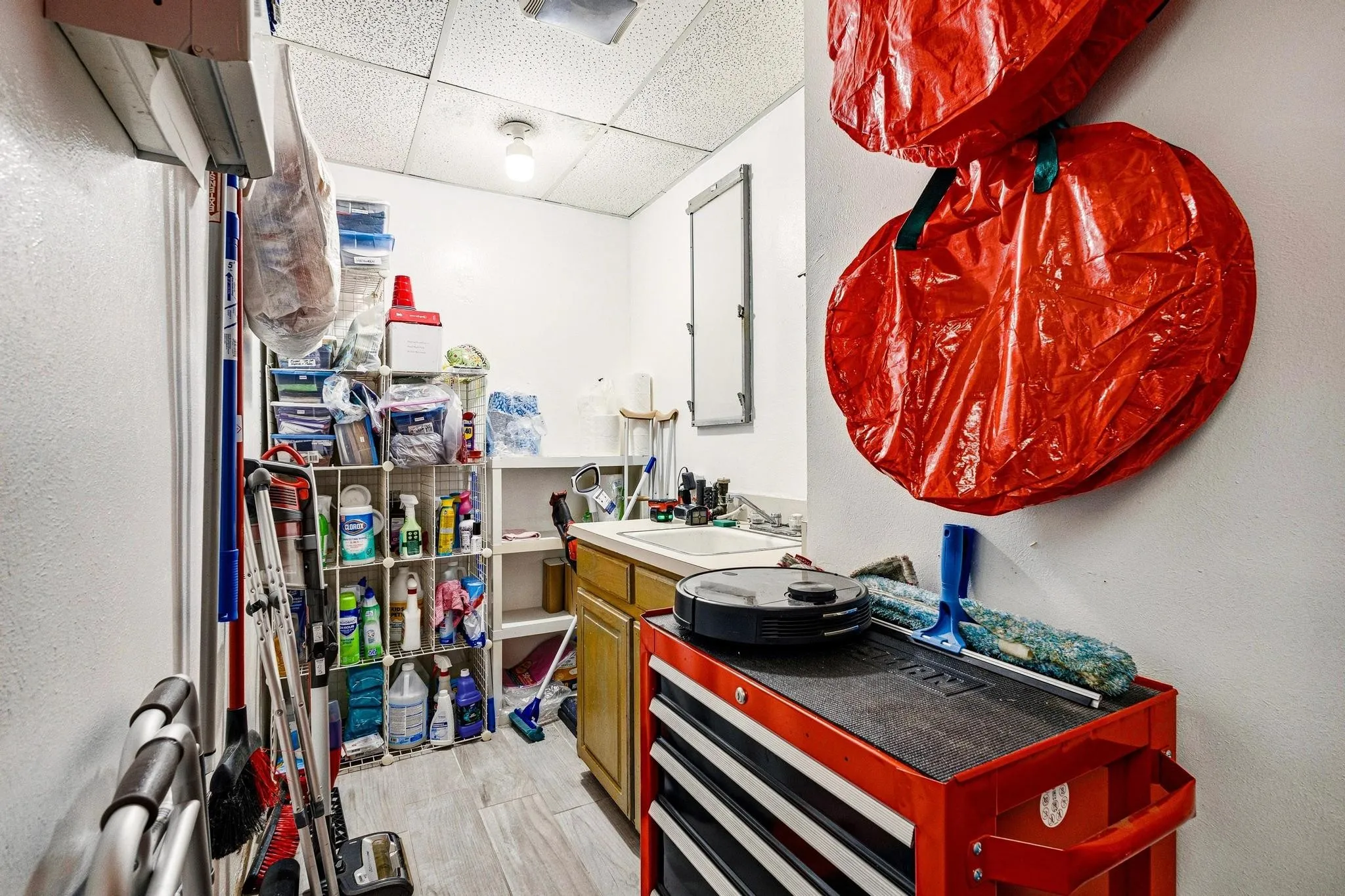 Previously a Darkroom for X-Ray Film, this Space with a Sink is Perfect for Storage