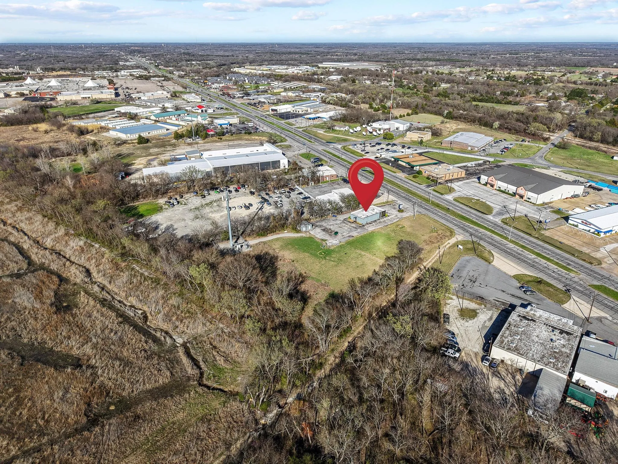 A Variety of Businesses Along Texoma Parkway Include Offices, Car Dealerships, Sparklight Cable, KXII TV Station, Restaurants and Much More!