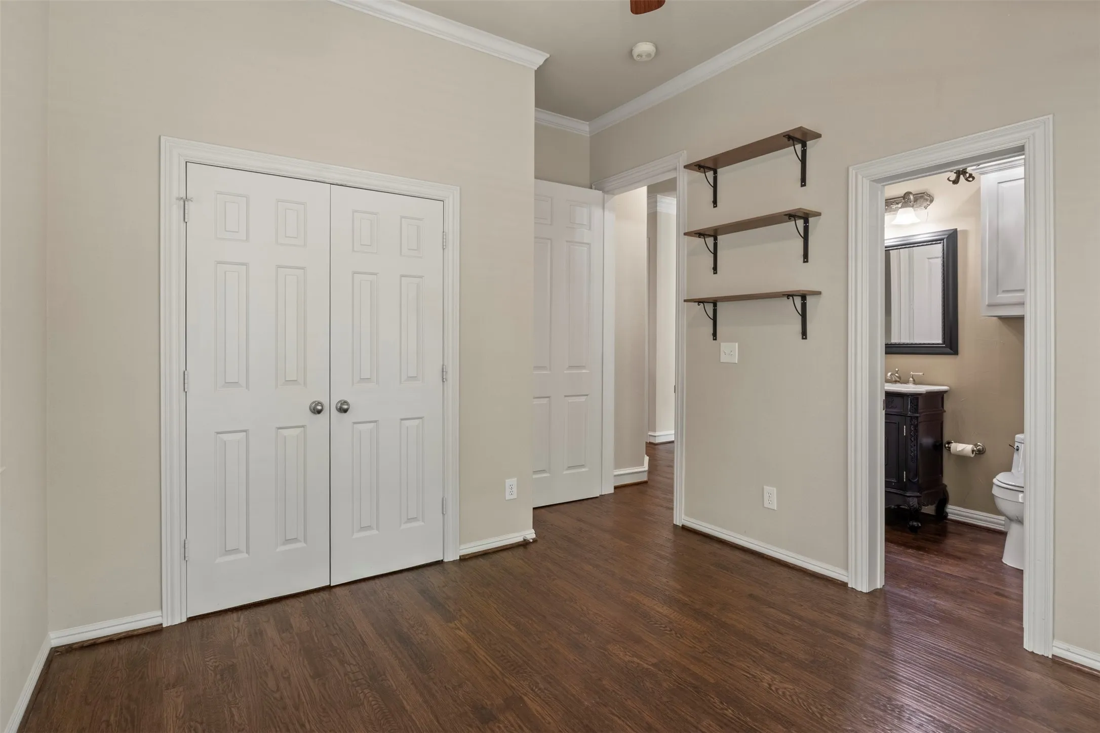 Main level guest bedroom with access to a full bath.