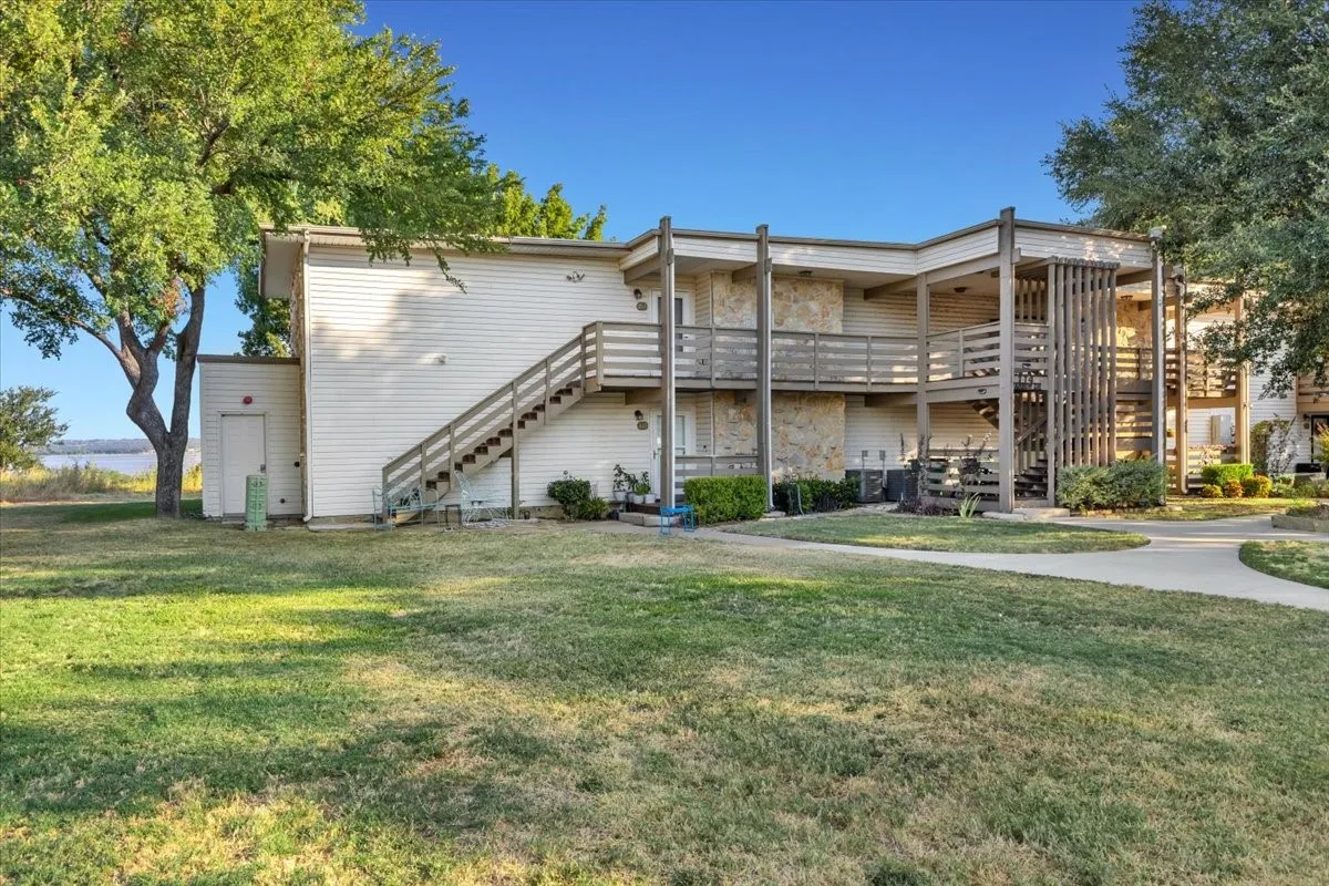 Condominium For Sale in Wise County , 114 Harbor Drive 219, Runaway Bay, Texas 76426, 3 Bedroom, 2 Bathroom, Garage spaces, 1,392 Sqft, built in 2016, mls#21373705, Real Estate Agent in Runaway Bay, Homes For Sale in Wise county, Homes For Sale in Runaway Bay, Realtor in Runaway Bay Texas, Real Estate Brokerage Independent Realty Texas, Luminita Cordes Realtor