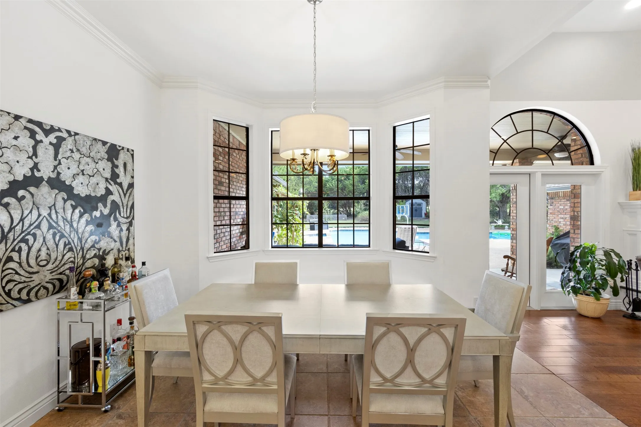 Bay window with black-framed multi-pane windows