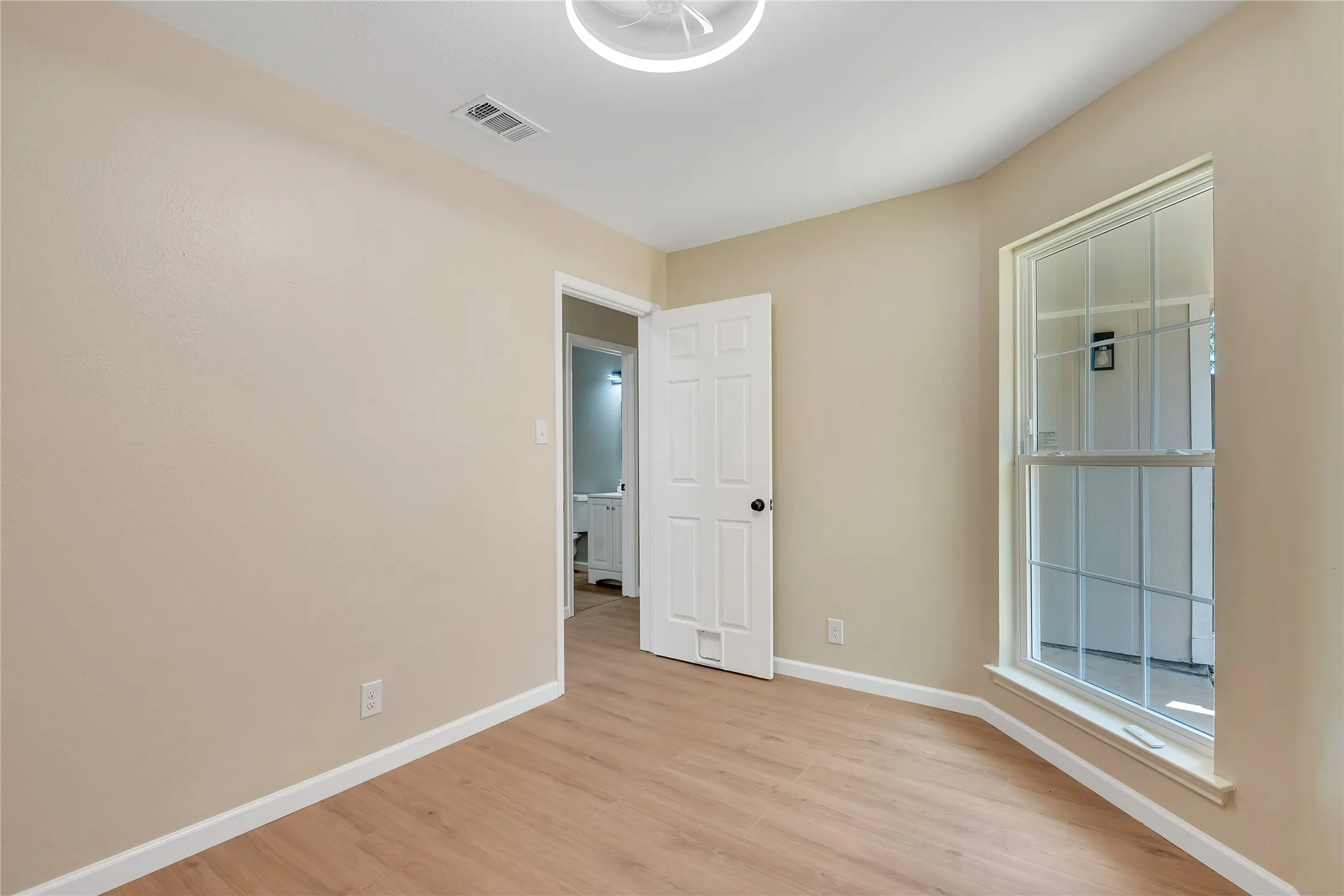 Neutral paint palette with wood-finish flooring
