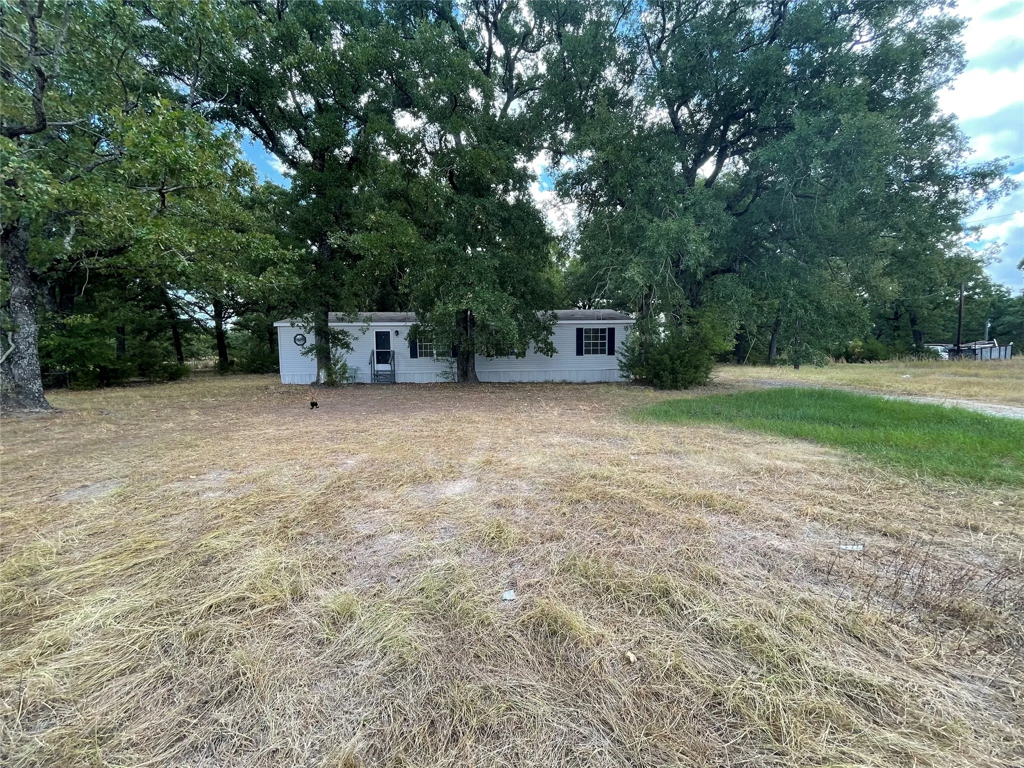 Manufactured Home For Sale in Hunt County , 303 Horseman S Road, Greenville, Texas 75401, 3 Bedroom, 2 Bathroom, Garage spaces, 2,128 Sqft, built in 1996, mls#21373771, Real Estate Agent in Greenville, Homes For Sale in Hunt county, Homes For Sale in Greenville, Realtor in Greenville Texas, Real Estate Brokerage Independent Realty Texas, Luminita Cordes Realtor