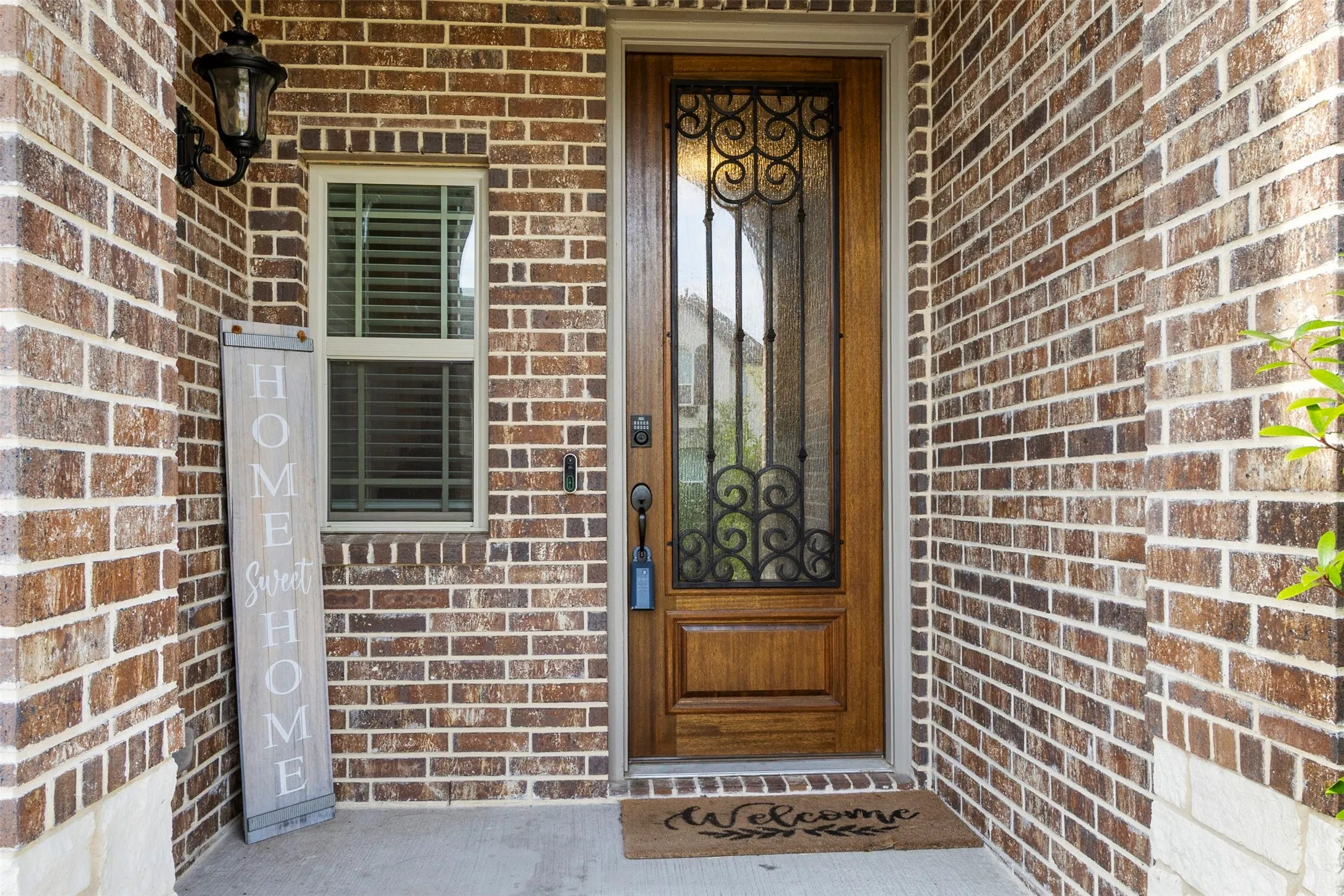 Brick exterior with a stone accent base