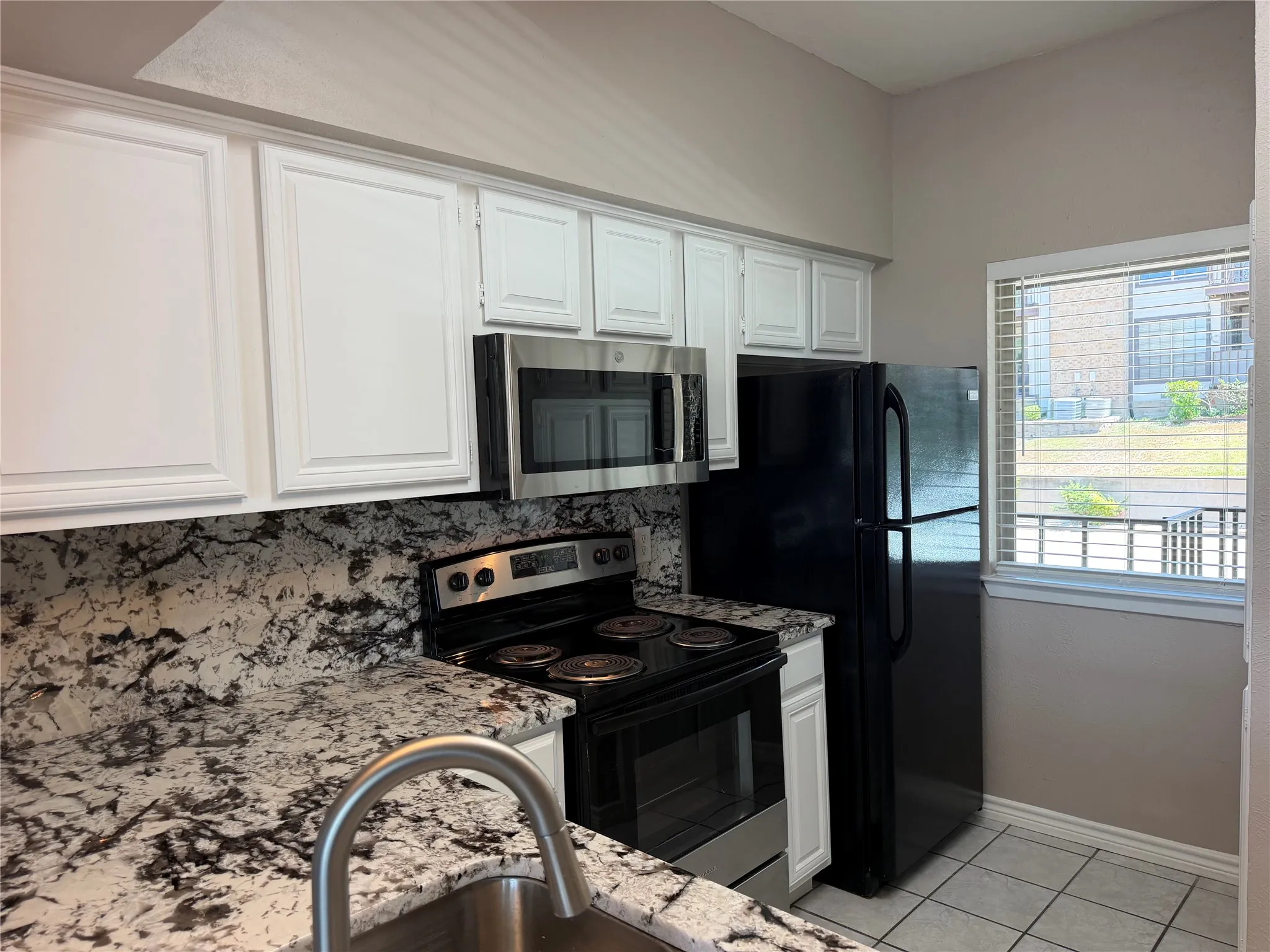 Recently Painted White Cabinets. Microwave. Both 2026 Updates.