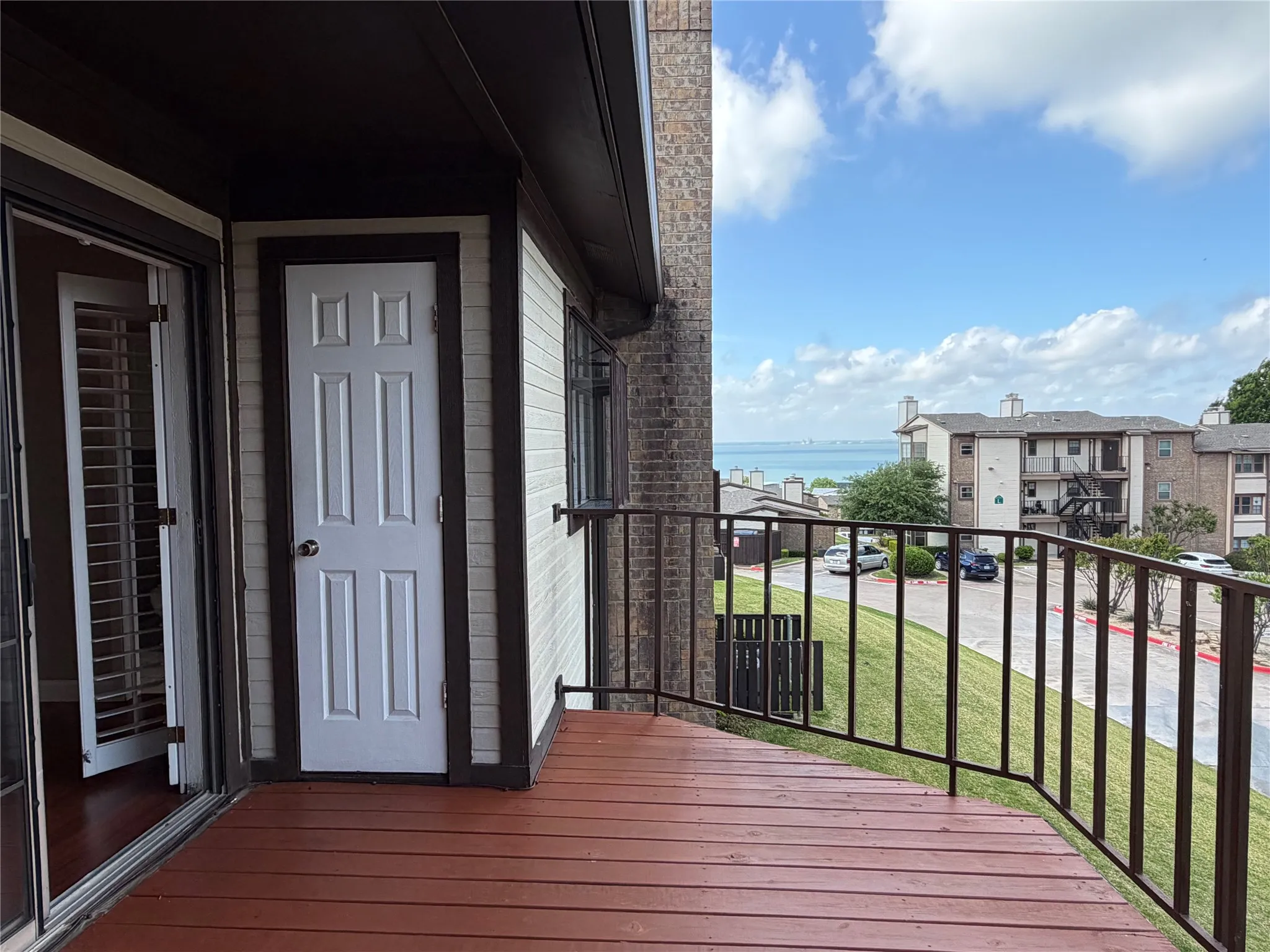 Extend Your Living to Balcony and Enjoy Sunsets, Sailboats and A View of Lake Ray Hubbard with Dallas Skyline in the Distance. Second Storage. Also Storage Room at Front Door.