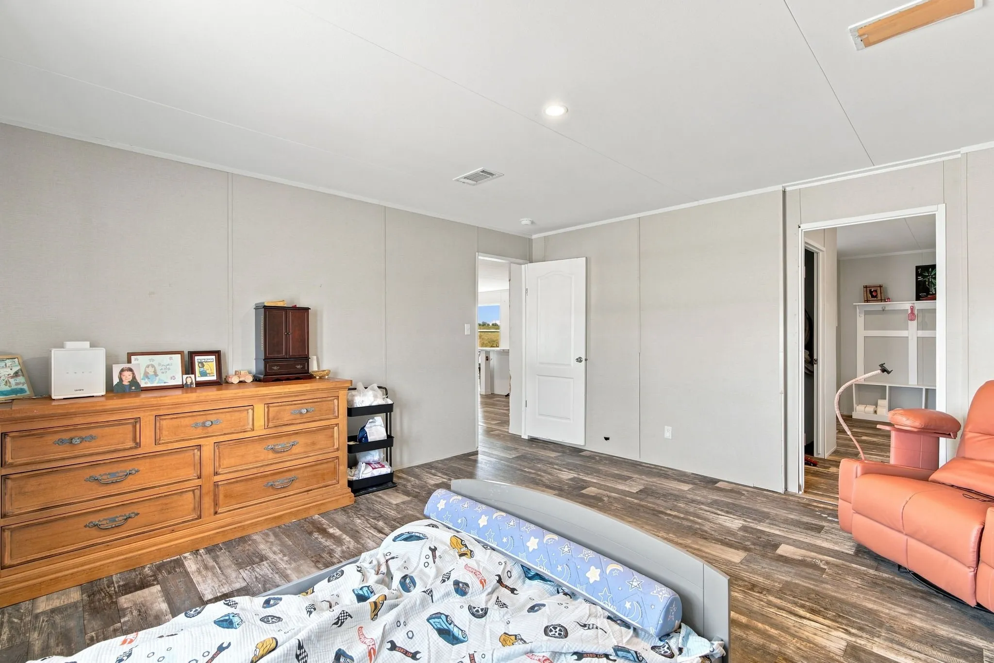 Wood-finish flooring throughout the space