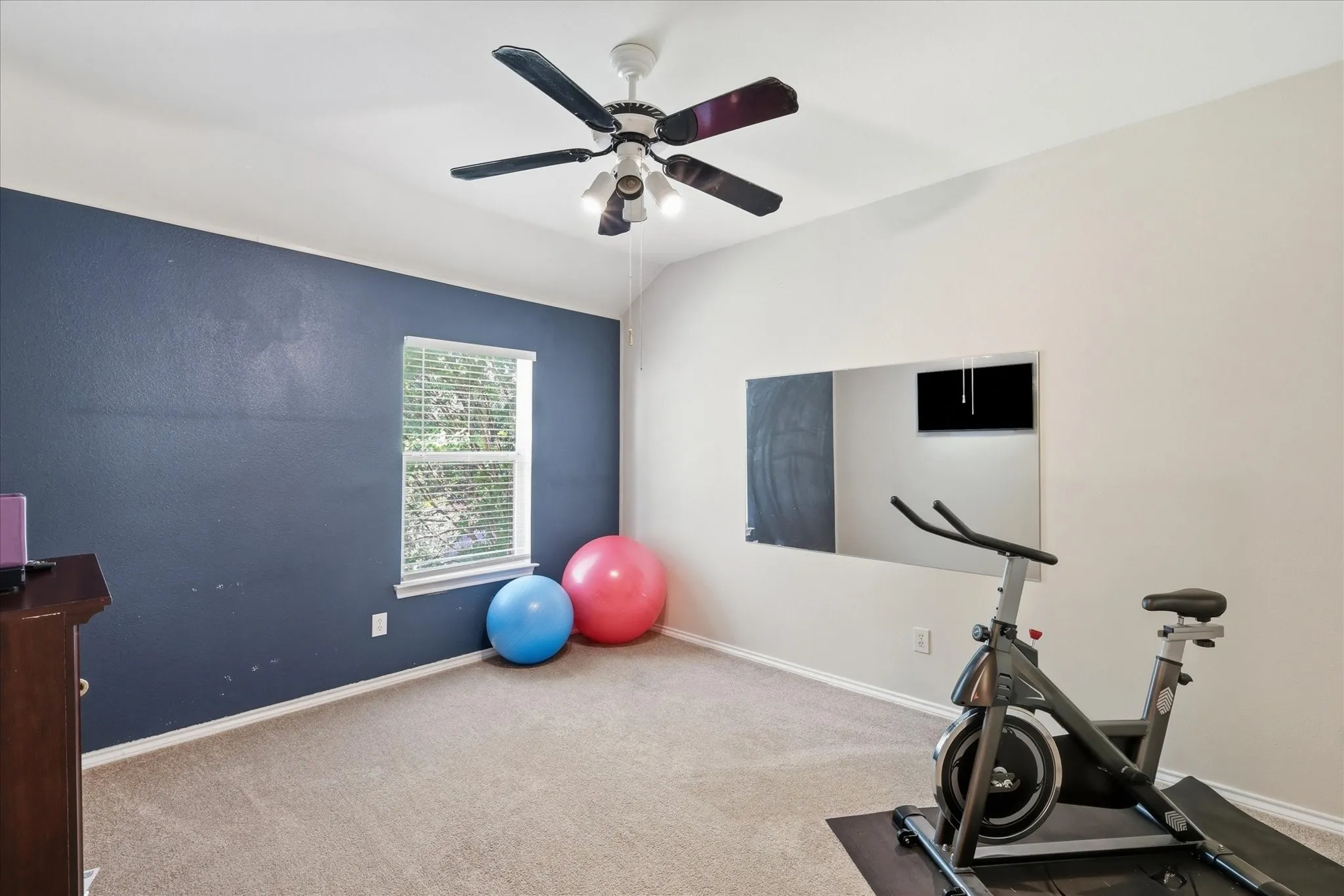 One of three secondary bedrooms, features walk in closet