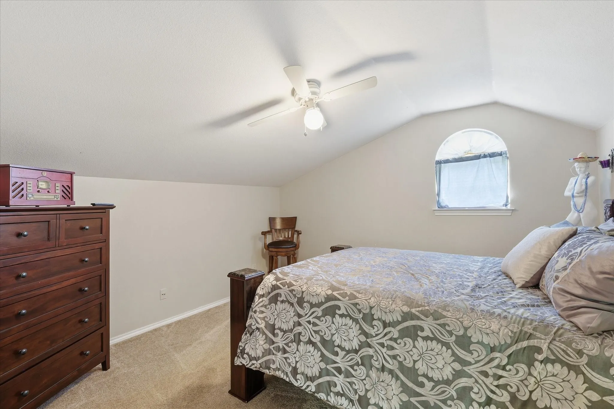 One of three secondary bedrooms