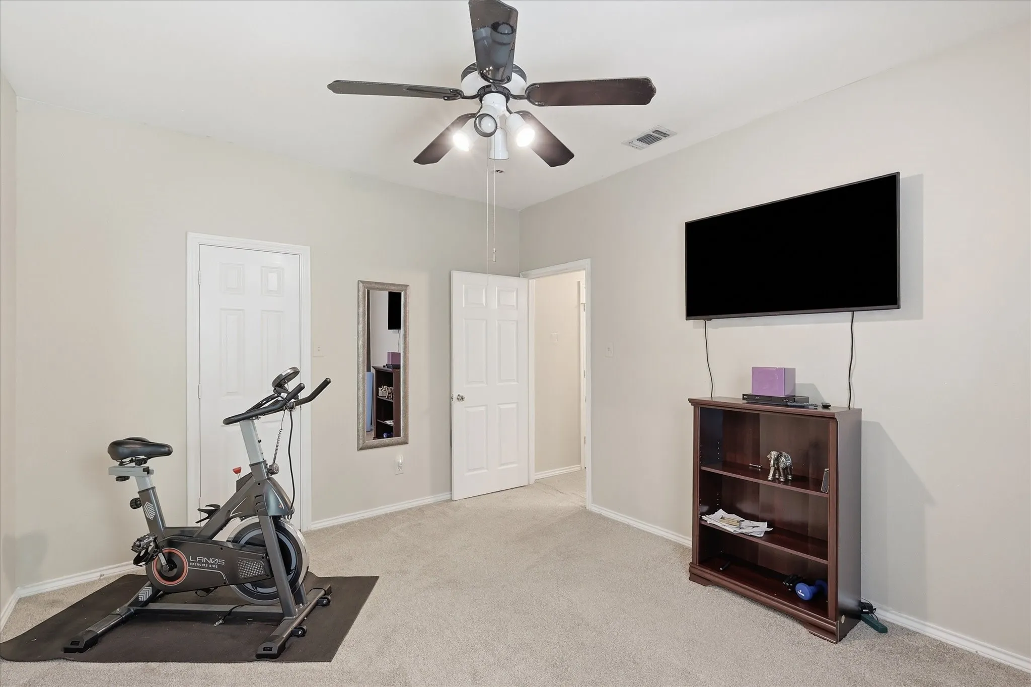 One of three secondary bedrooms