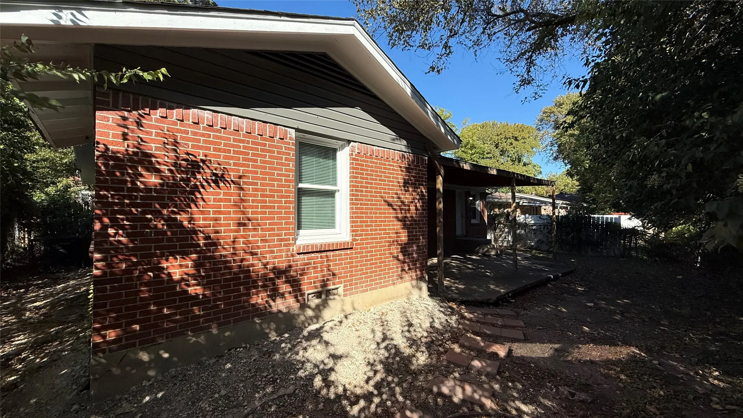 Brick exterior with horizontal siding accents