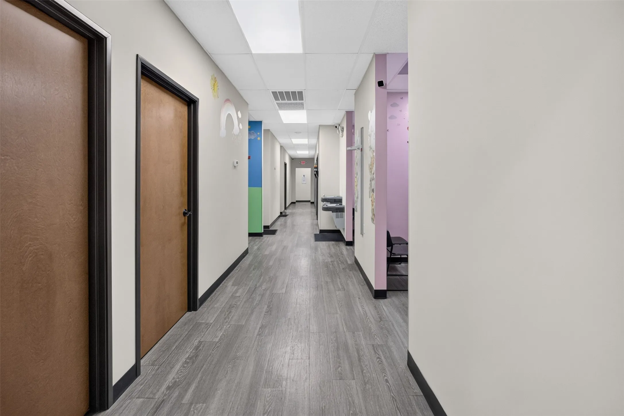 HALLWAY TO THE EXAMINING ROOMS