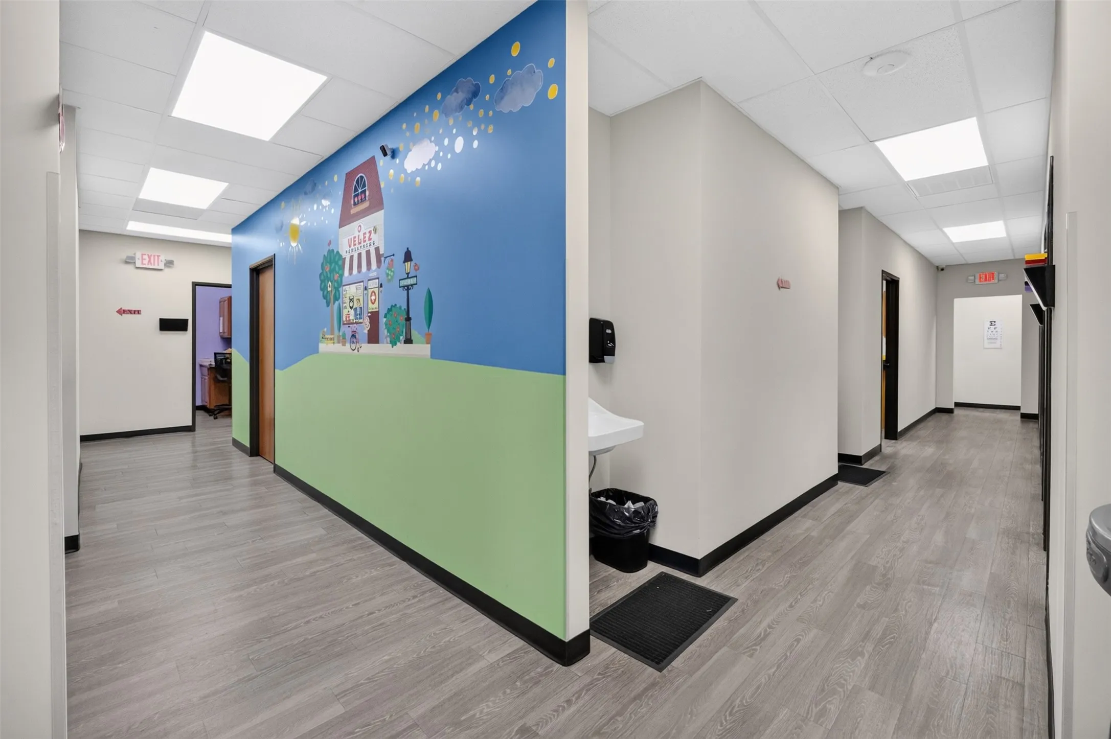 HALLWAY TO THE EXAMINING ROOMS