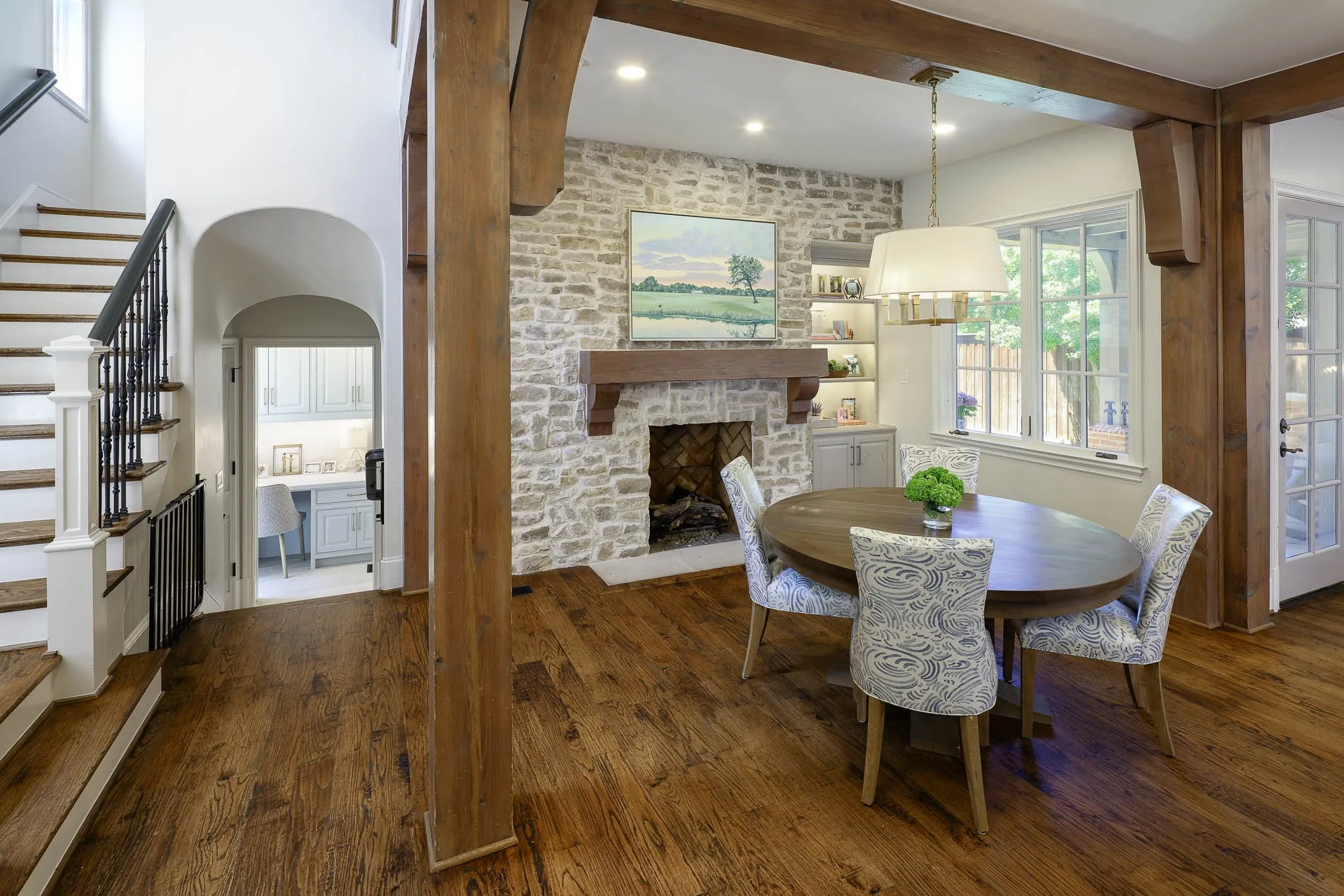 Breakfast room with adjacent home management office and mud room