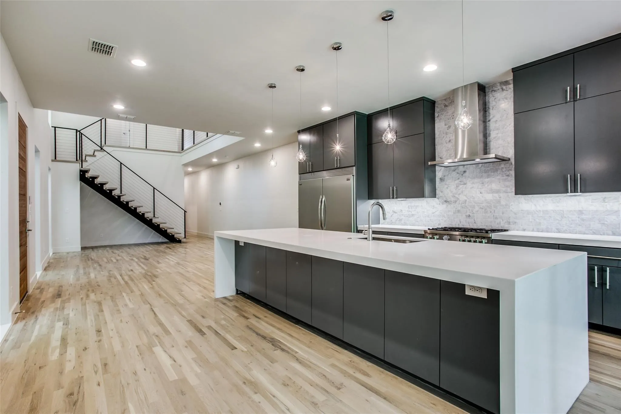 Expansive island provides additional dining space.