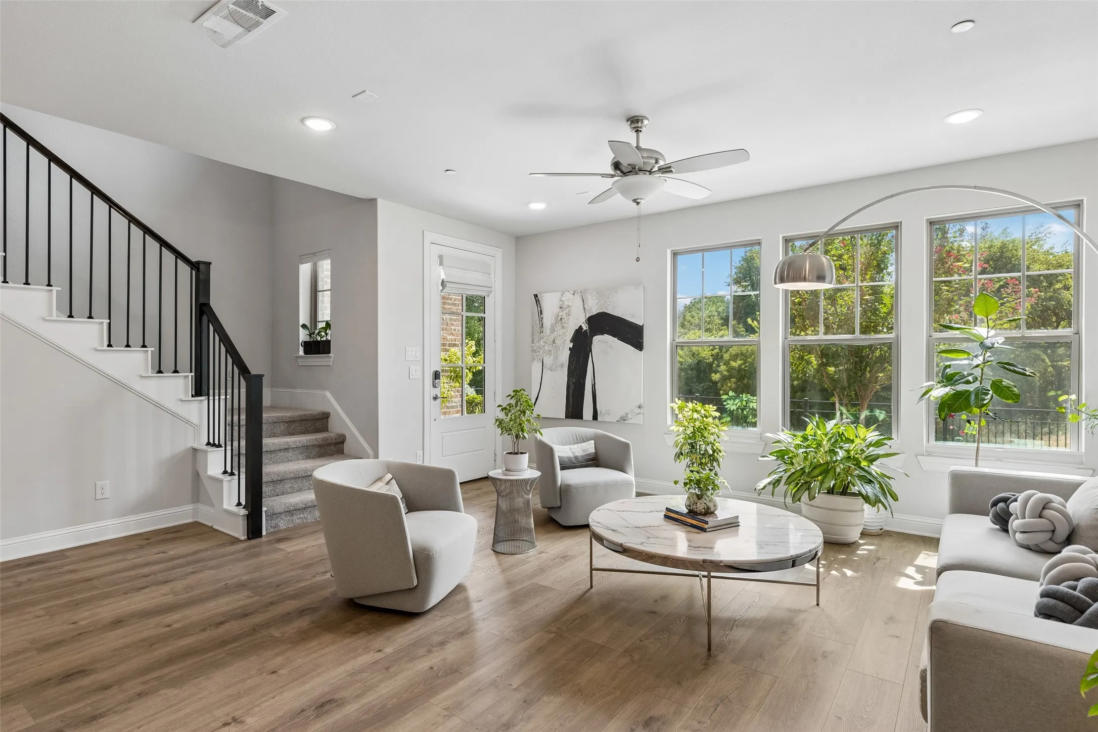 Elegant stairway and wood-style LVP flooring