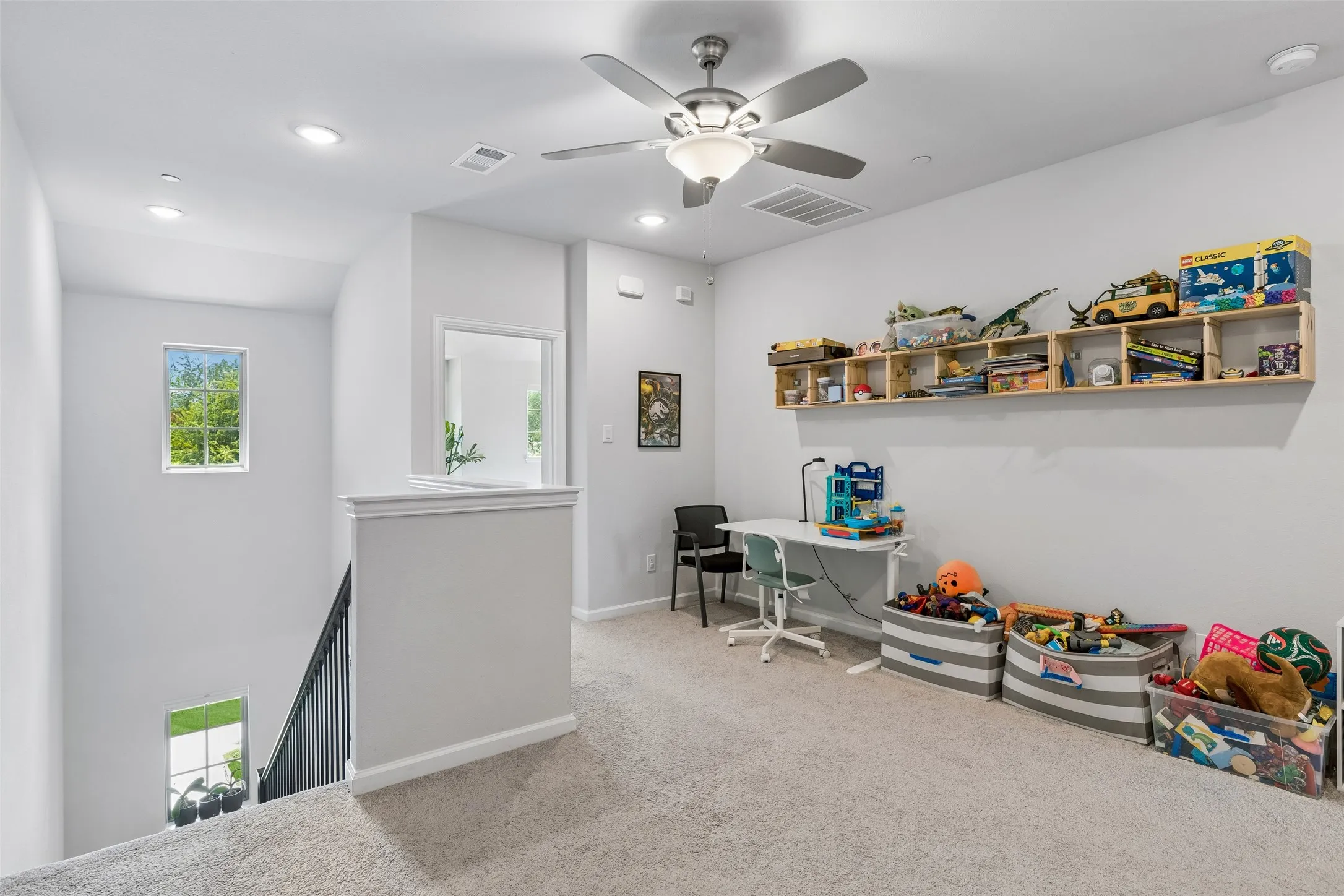 Bright and open.  Lots of space for hobbies or relaxing upstairs