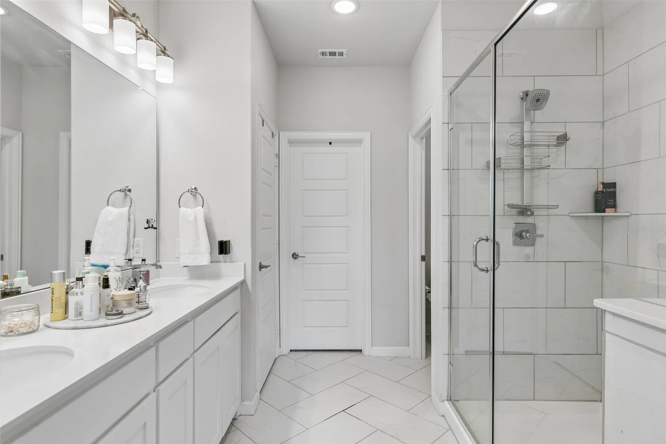 Huge primary bathroom with separate oversized walkin shower