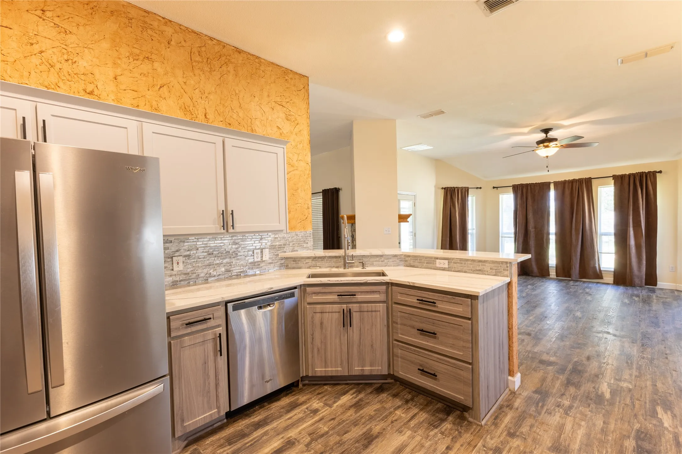 Kitchen leads to Den