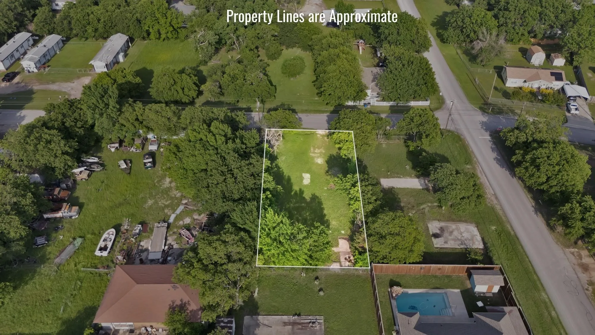 Aerial overview of property's location with property parcel outlined