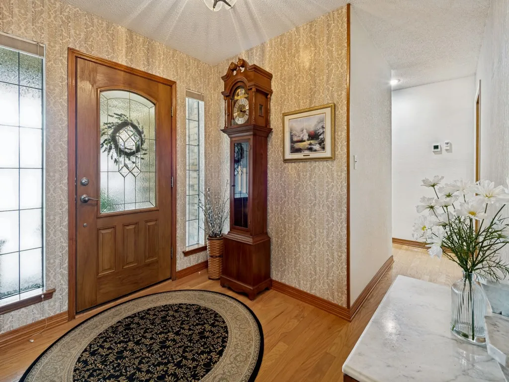 Entry foyer is inviting and includes a coat closet.