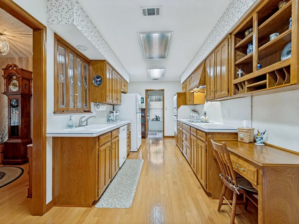 There is a door to the right at the far end that leads straight into the garage. Bring groceries right into the kitchen!