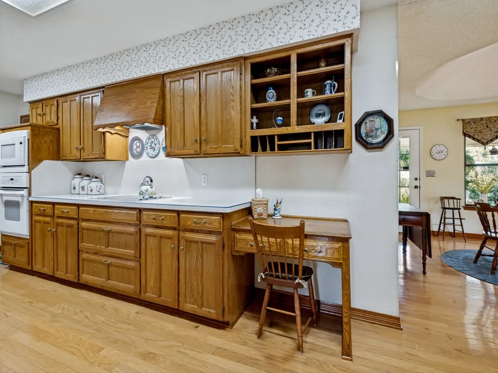 Notice the desk built in which is ideal for your computer, recipes, homework and more!