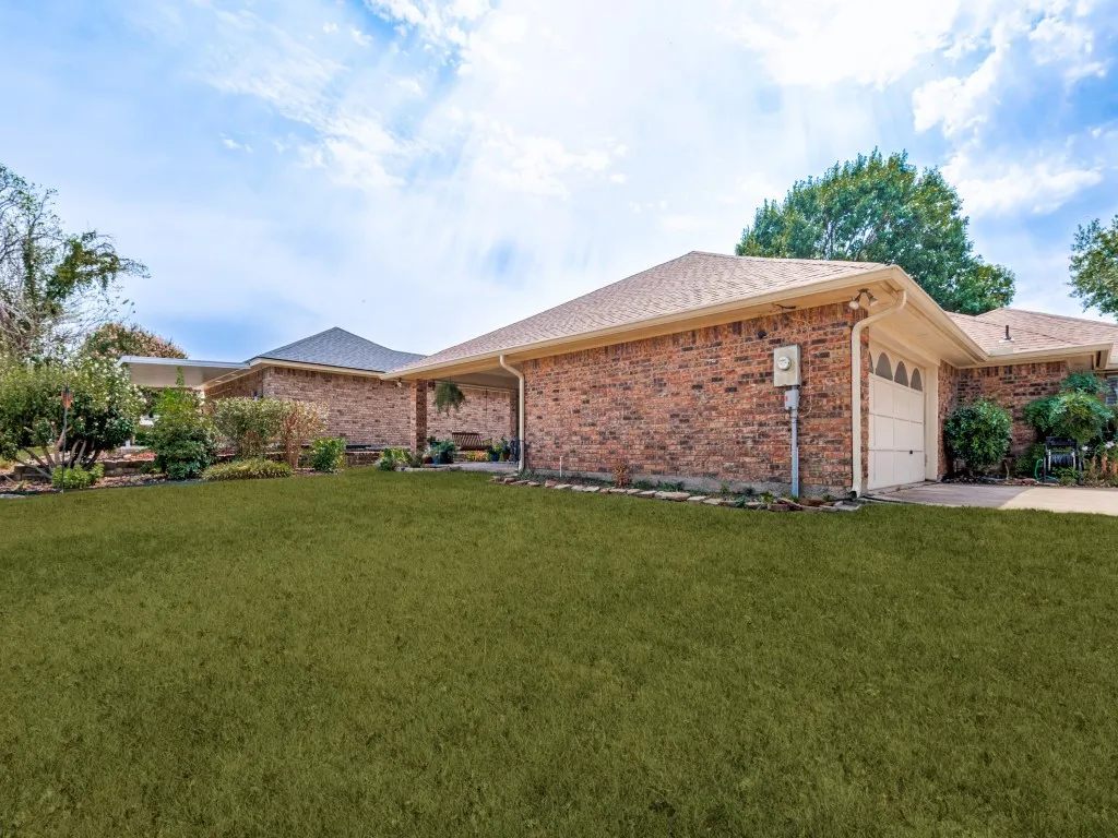 This view shows the side entry of the 2 car garage with a single door.