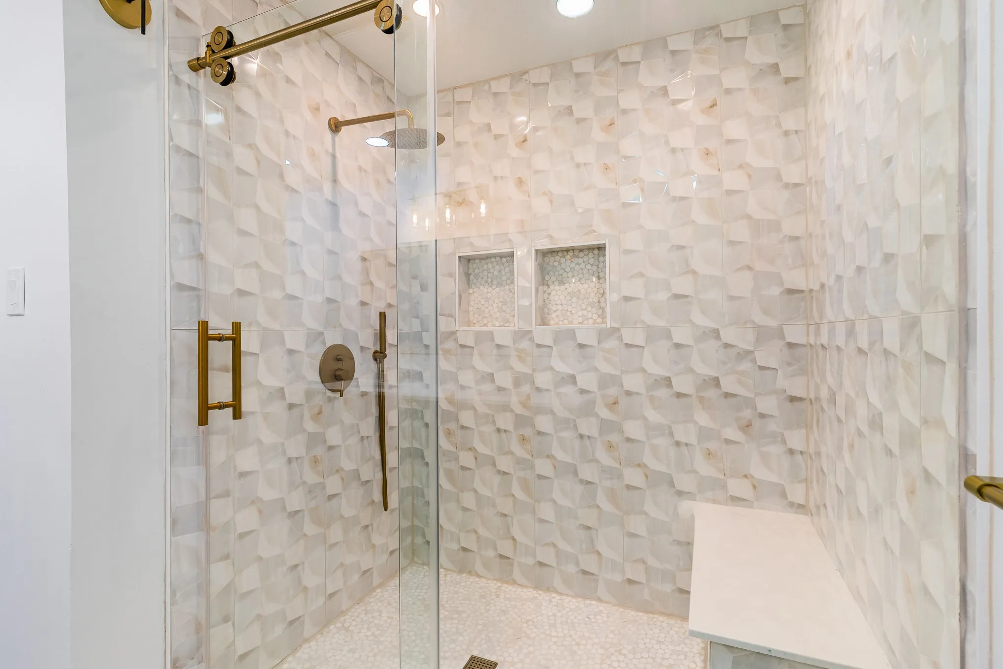 Bathroom with a shower with door