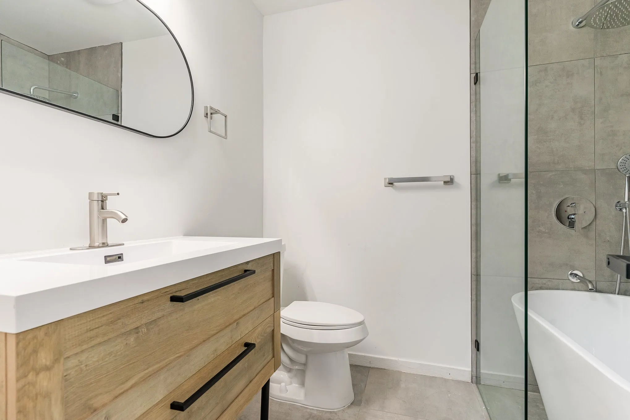 Full bathroom featuring tile patterned floors, vanity, toilet, and plus walk in shower