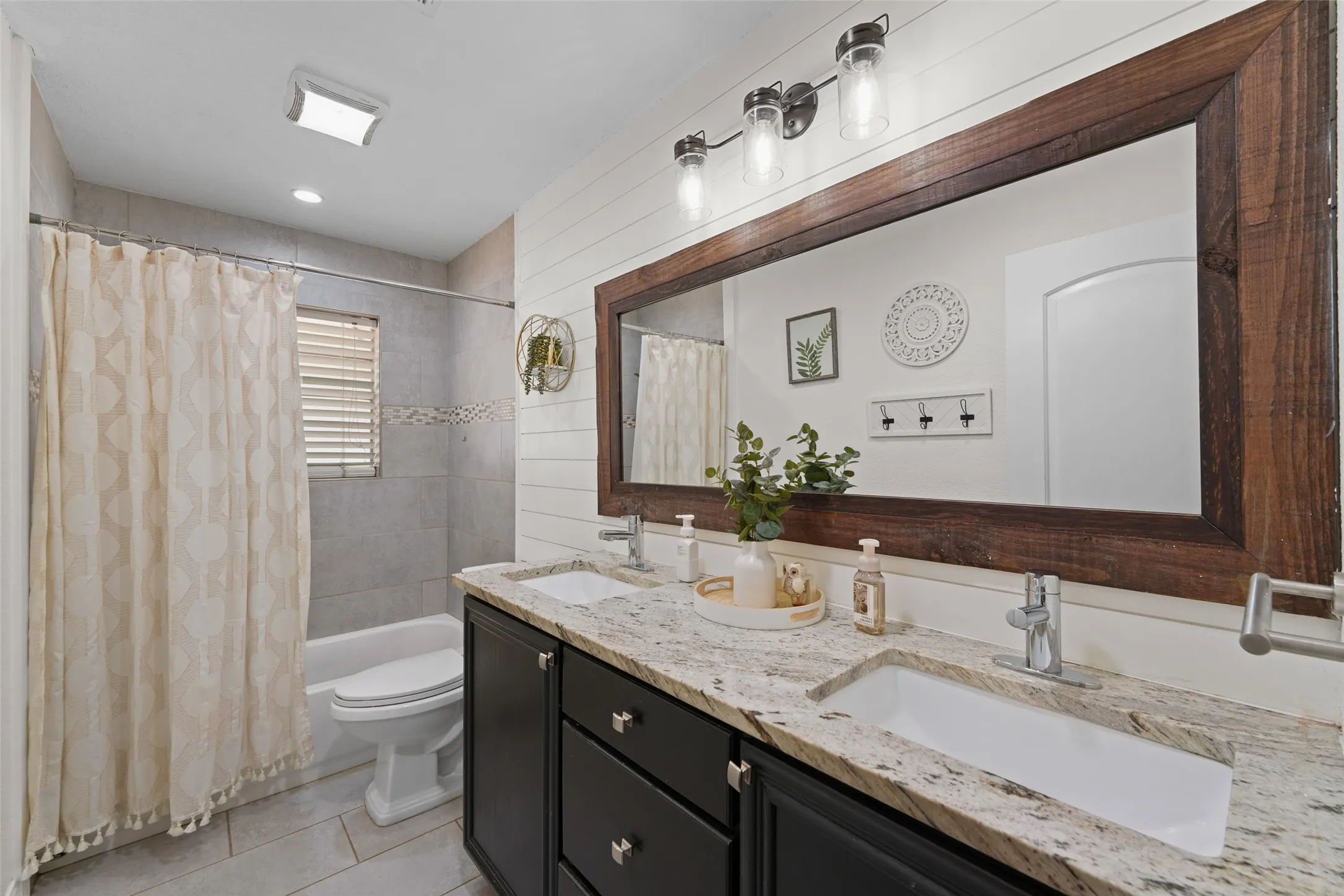 Dual vanity with stone countertop and integrated rectangular sinks