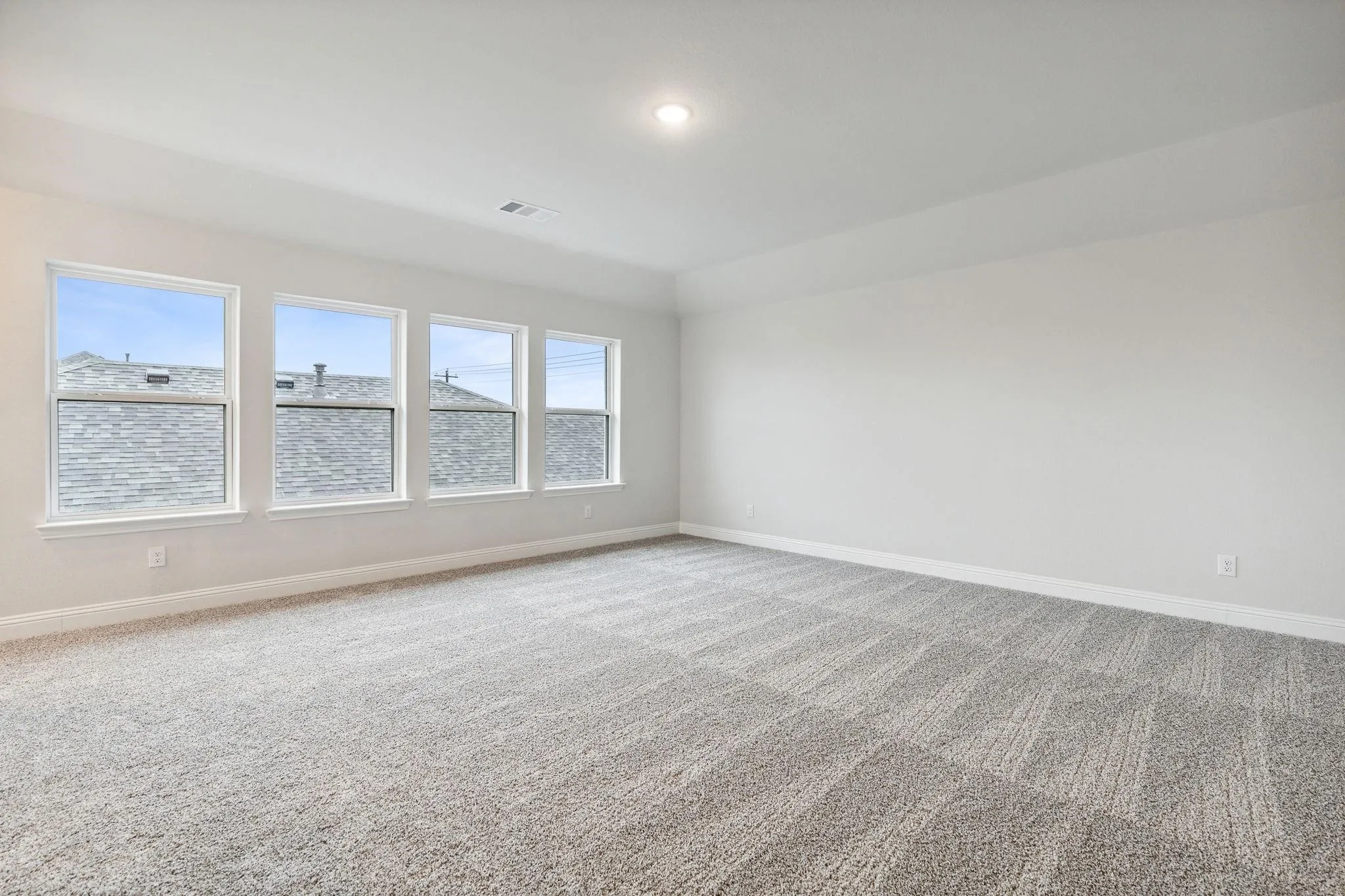 Unfurnished room featuring carpet