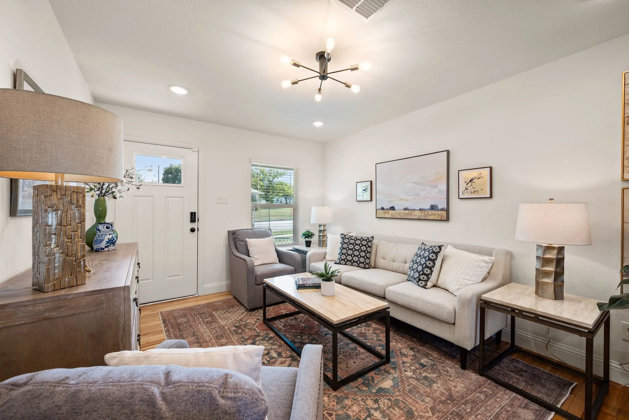 Recessed Lighting and 2-inch white blinds throughout
