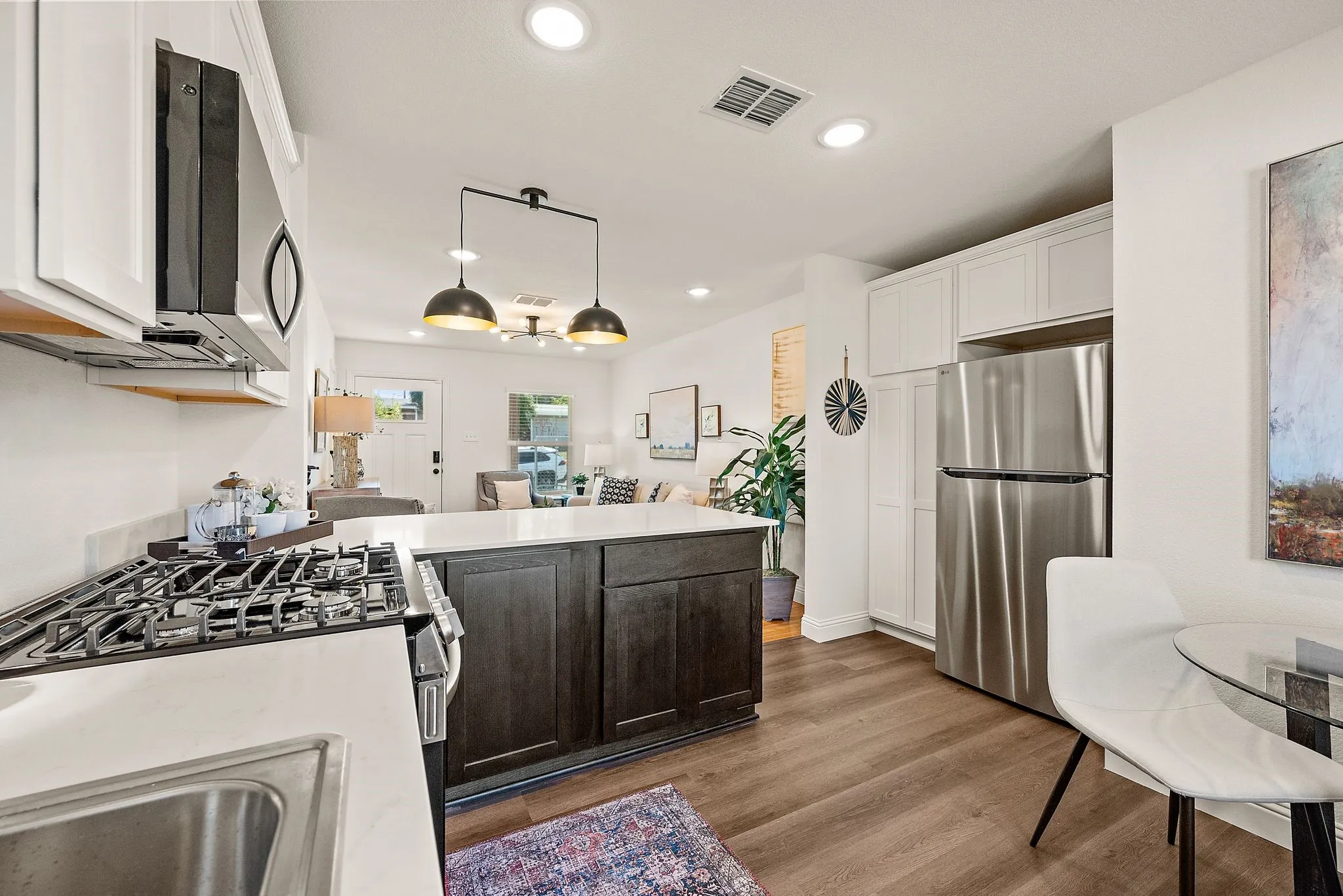 Cabinets to left of Fridge space is a pantry!
