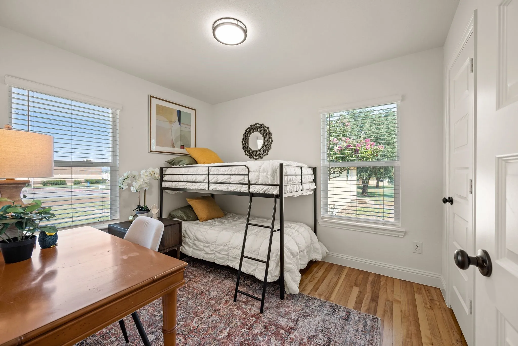 Bedroom 2 has refinished original Wood flooring and Double Closets