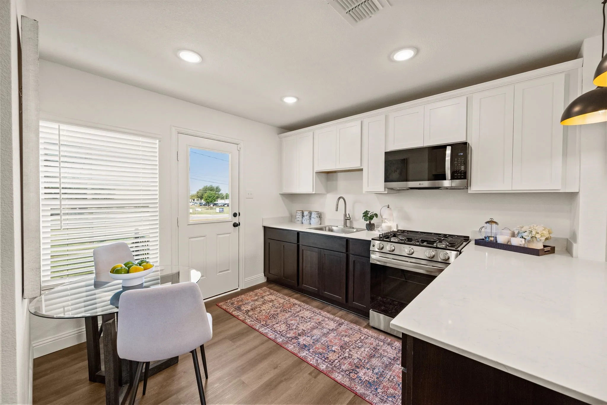 Plentiful Built-in Cabinetry; Half-glass at back door