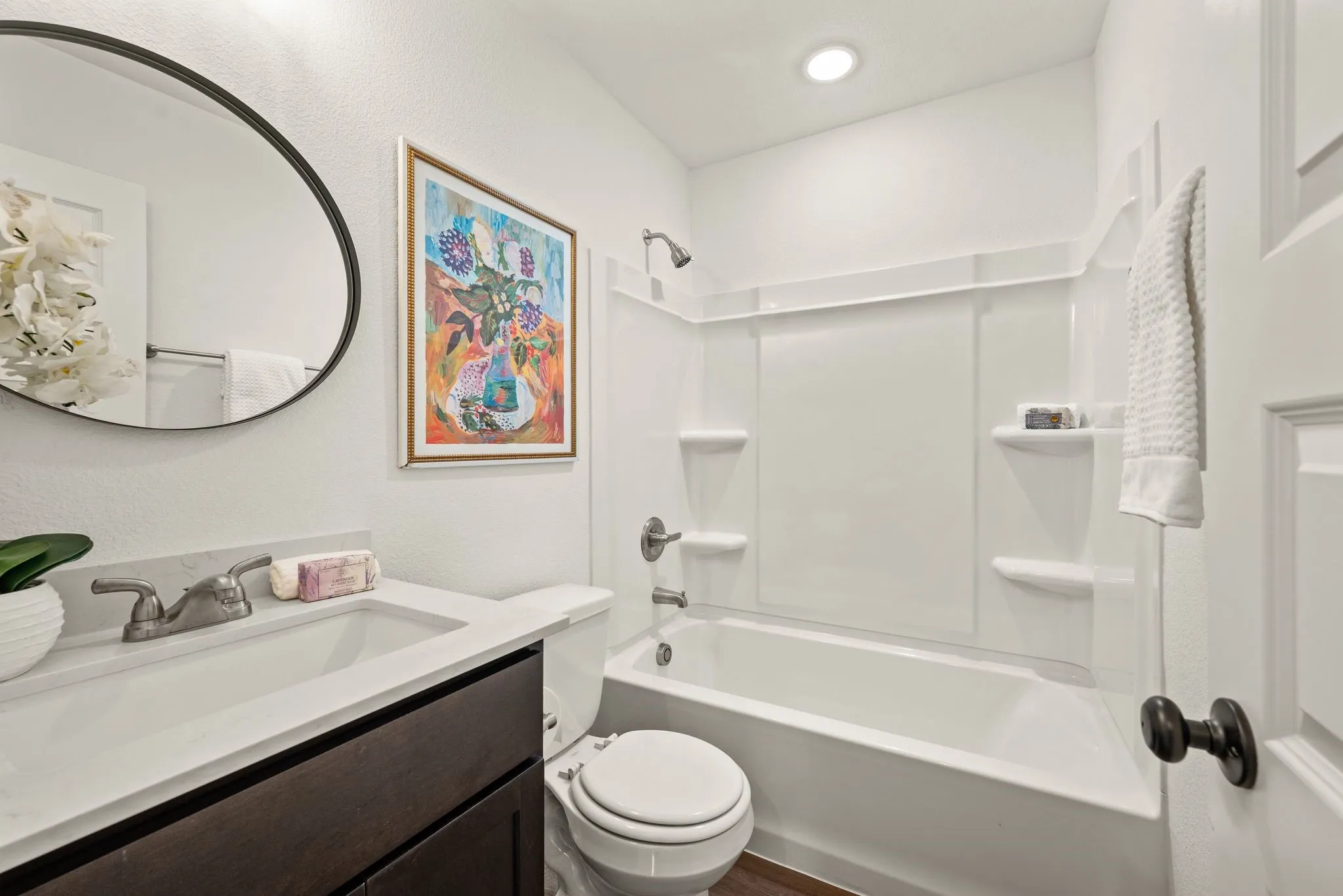 Full bathroom; Quartz countertops; Luxury Vinyl Plank