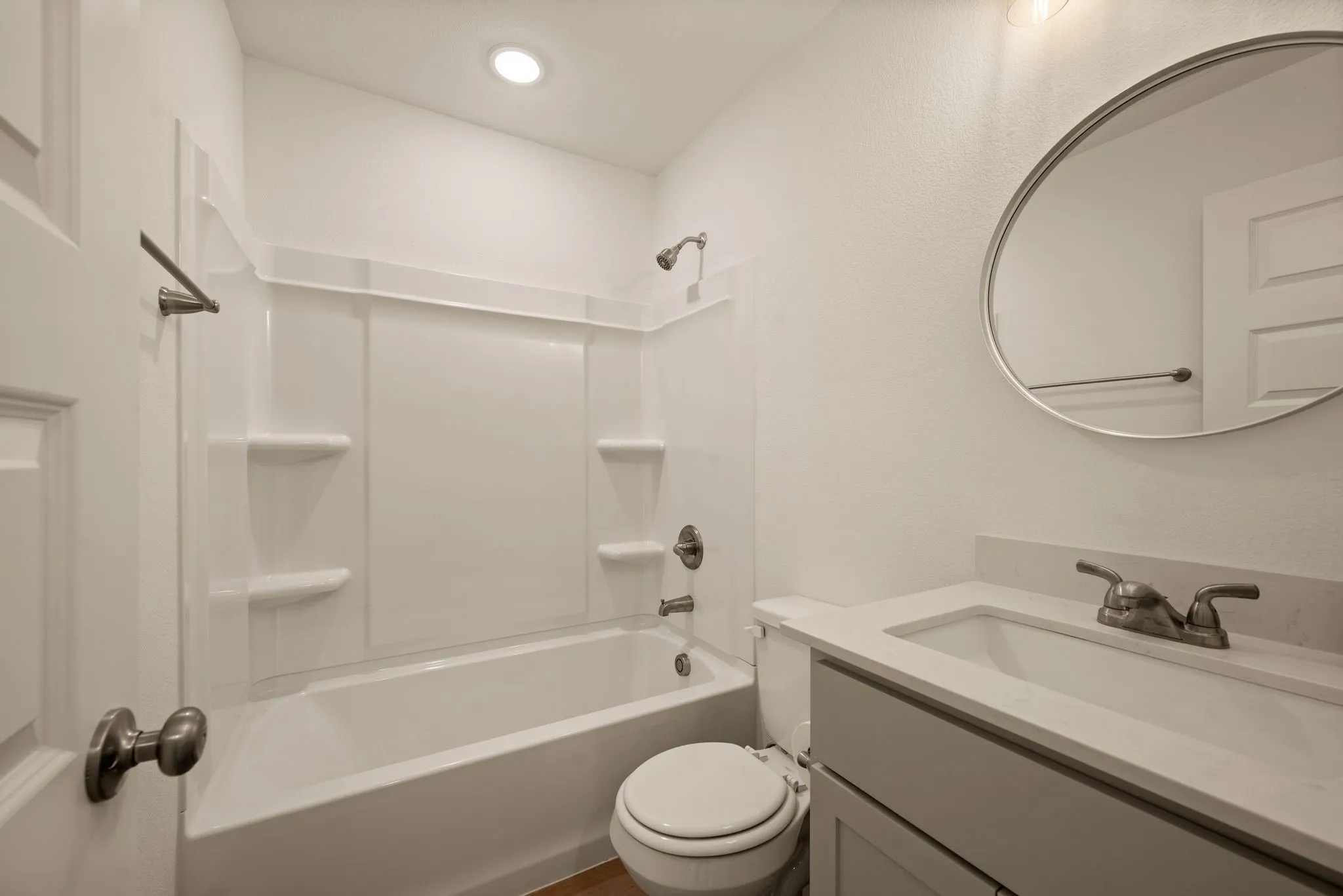 Full bathroom; Quartz countertops; Luxury Vinyl Plank
