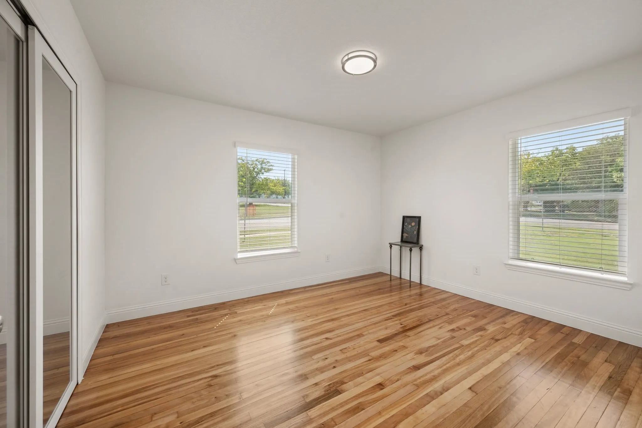 Bedroom 1 has refinished original Wood flooring
