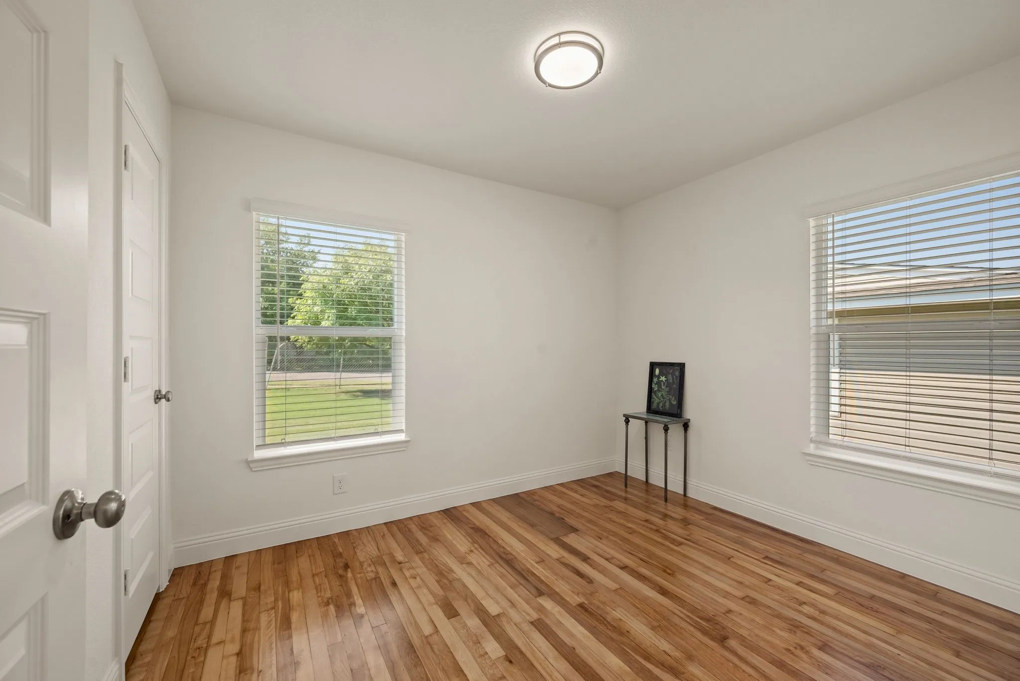 Bedroom 2 has refinished original Wood flooring and Double Closets