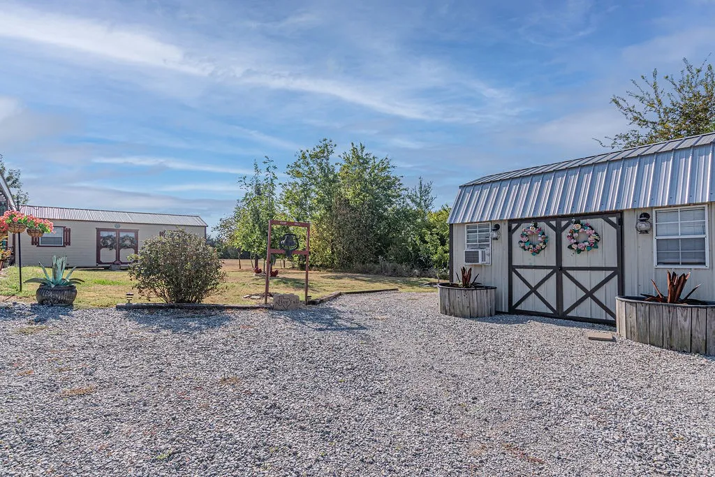 Two of the three sheds with electric, heat, and air conditioning