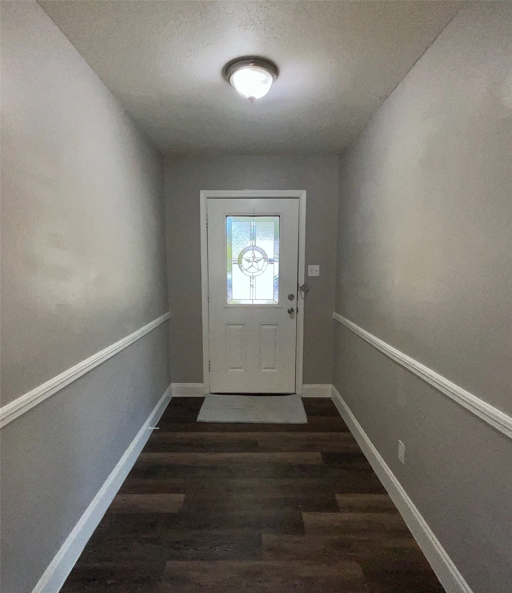 Welcoming Foyer with Ample Space for a Hall Tree, Console Table, or Personal Décor